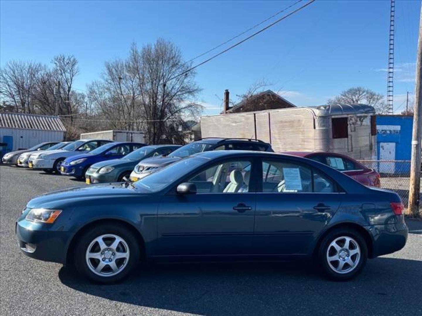 2006 Blue Hyundai SONATA GLS (5NPEU46C46H) with an 2.4L 4 Cylinder Fuel Injected engine, Automatic transmission, located at 50 Eastern Blvd., Essex, MD, 21221, (410) 686-3444, 39.304367, -76.484947 - Photo#1