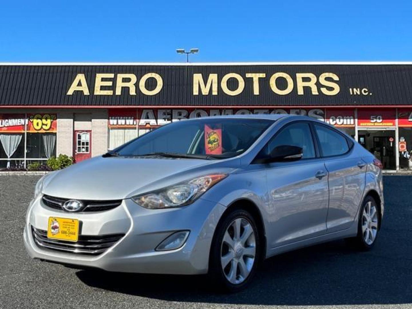 2012 Silver Hyundai ELANTRA Limited (5NPDH4AE6CH) with an 1.8L 1.8L I4 148hp 131ft. lbs. Sequential Fuel Injection engine, 6-Speed Shiftable Automatic transmission, located at 50 Eastern Blvd., Essex, MD, 21221, (410) 686-3444, 39.304367, -76.484947 - Photo#0