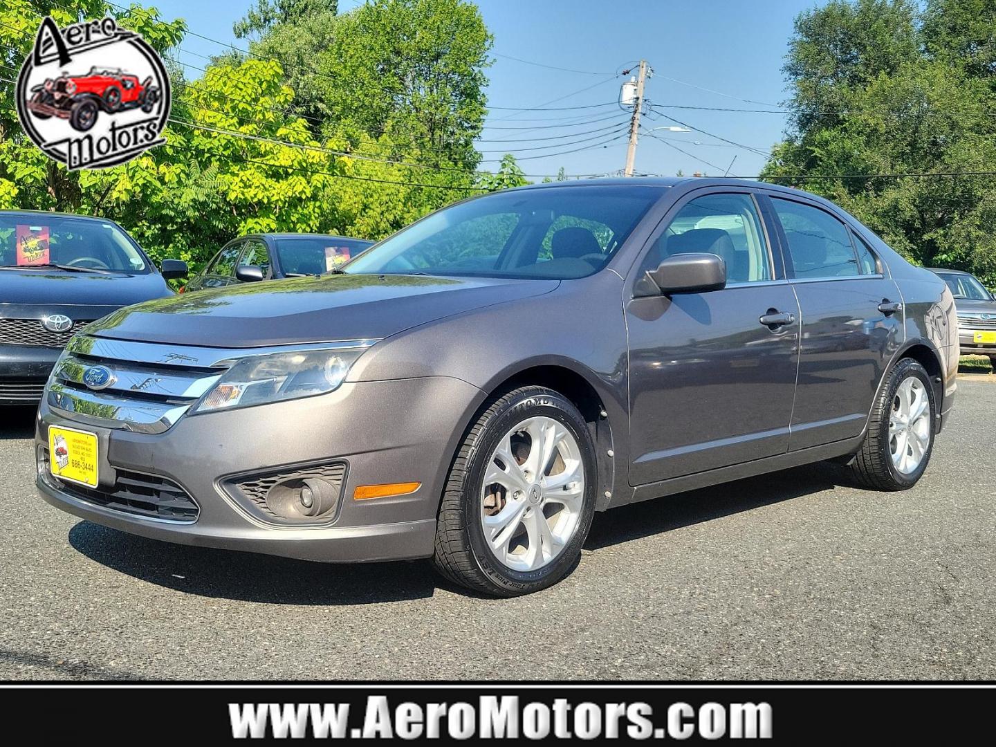 2012 GRAY Ford Fusion SE (3FAHP0HA9CR) with an 2.5L 16V I4 DURATEC ENGINE engine, located at 50 Eastern Blvd., Essex, MD, 21221, (410) 686-3444, 39.304367, -76.484947 - Elevate your driving experience with this 2012 Ford Fusion SE 4dr Sdn SE FWD in a classic gray exterior. Powered by a highly efficient 2.5L 16V I4 Duratec engine, this vehicle promises excellent performance and reliable durability. The Fusion delicately combines sporty dynamism and comfortable luxur - Photo#0