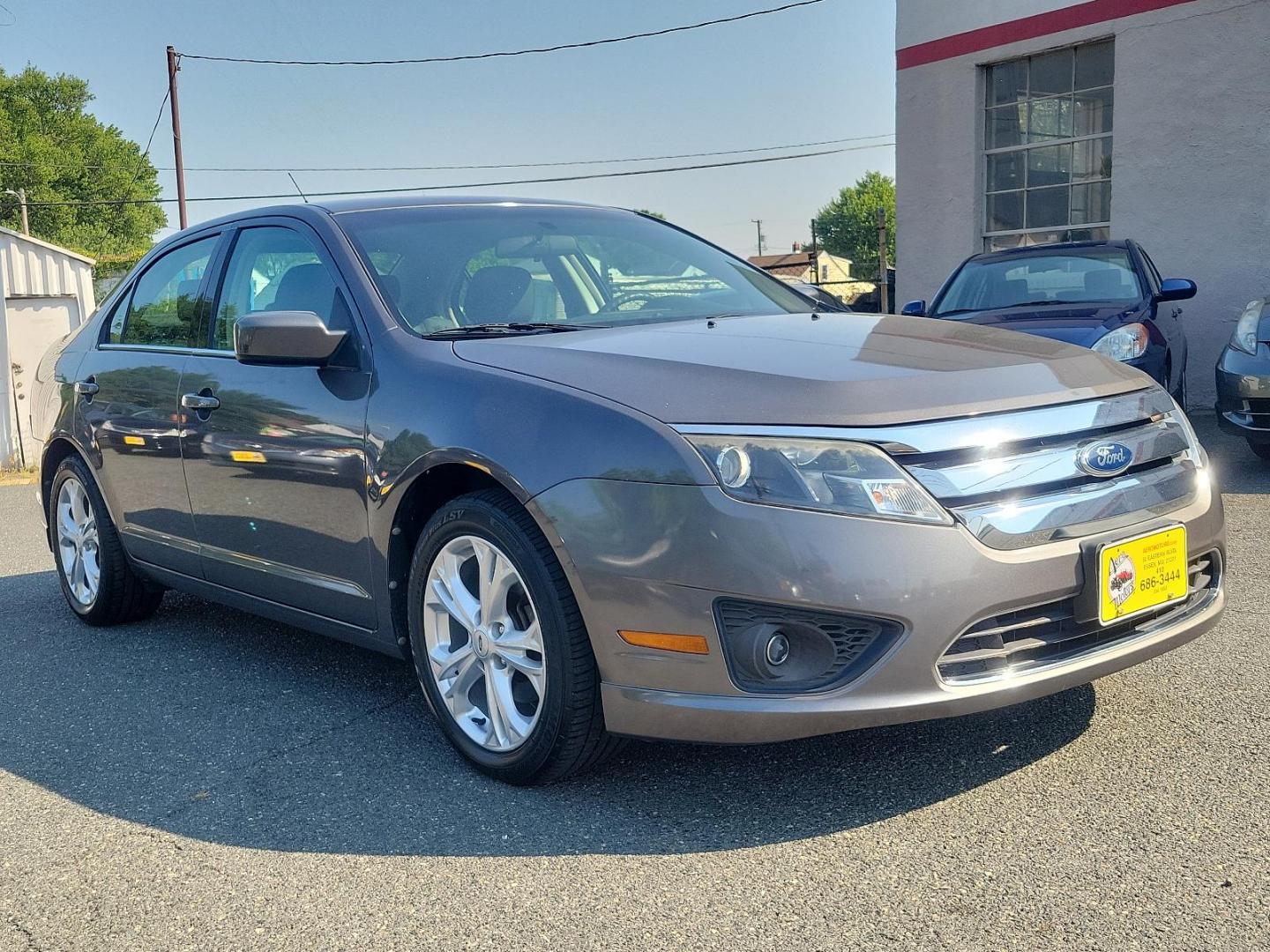 2012 GRAY Ford Fusion SE (3FAHP0HA9CR) with an 2.5L 16V I4 DURATEC ENGINE engine, located at 50 Eastern Blvd., Essex, MD, 21221, (410) 686-3444, 39.304367, -76.484947 - Elevate your driving experience with this 2012 Ford Fusion SE 4dr Sdn SE FWD in a classic gray exterior. Powered by a highly efficient 2.5L 16V I4 Duratec engine, this vehicle promises excellent performance and reliable durability. The Fusion delicately combines sporty dynamism and comfortable luxur - Photo#2