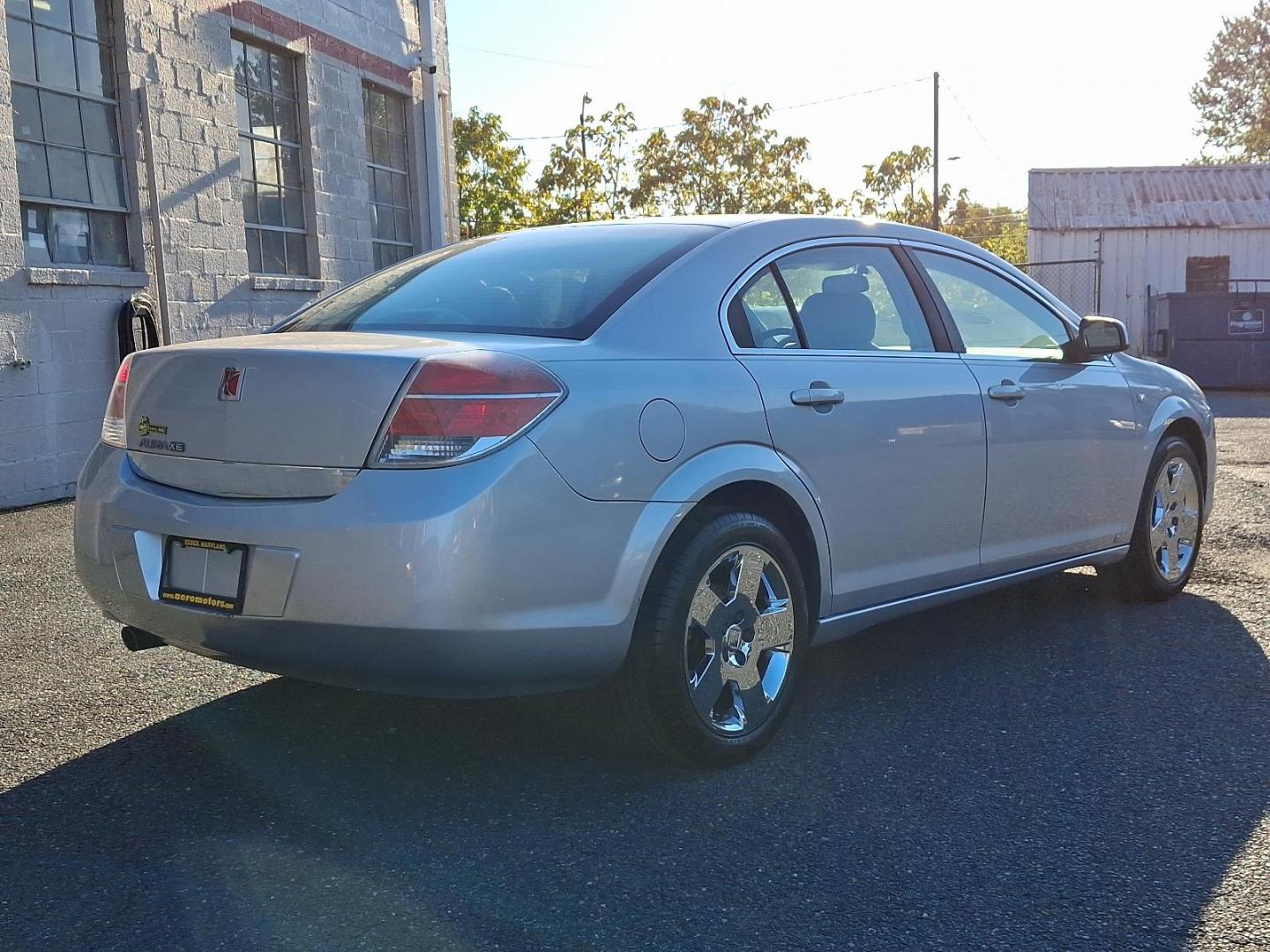 2009 Quicksilver - 17U /Gray - 85B Saturn Aura XE (1G8ZS57B99F) with an ENGINE, ECOTEC 2.4L 4-CYLINDER engine, located at 50 Eastern Blvd., Essex, MD, 21221, (410) 686-3444, 39.304367, -76.484947 - Step into the driver's seat of this sophisticated 2009 Saturn Aura XE 4dr Sdn I4 XE, an epitome of sleek design and reliable performance. Coated in an enchanting Quicksilver exterior perfectly contrasted with a nearly untouched Gray interior, this vehicle promises an exemplary blend of style and com - Photo#3