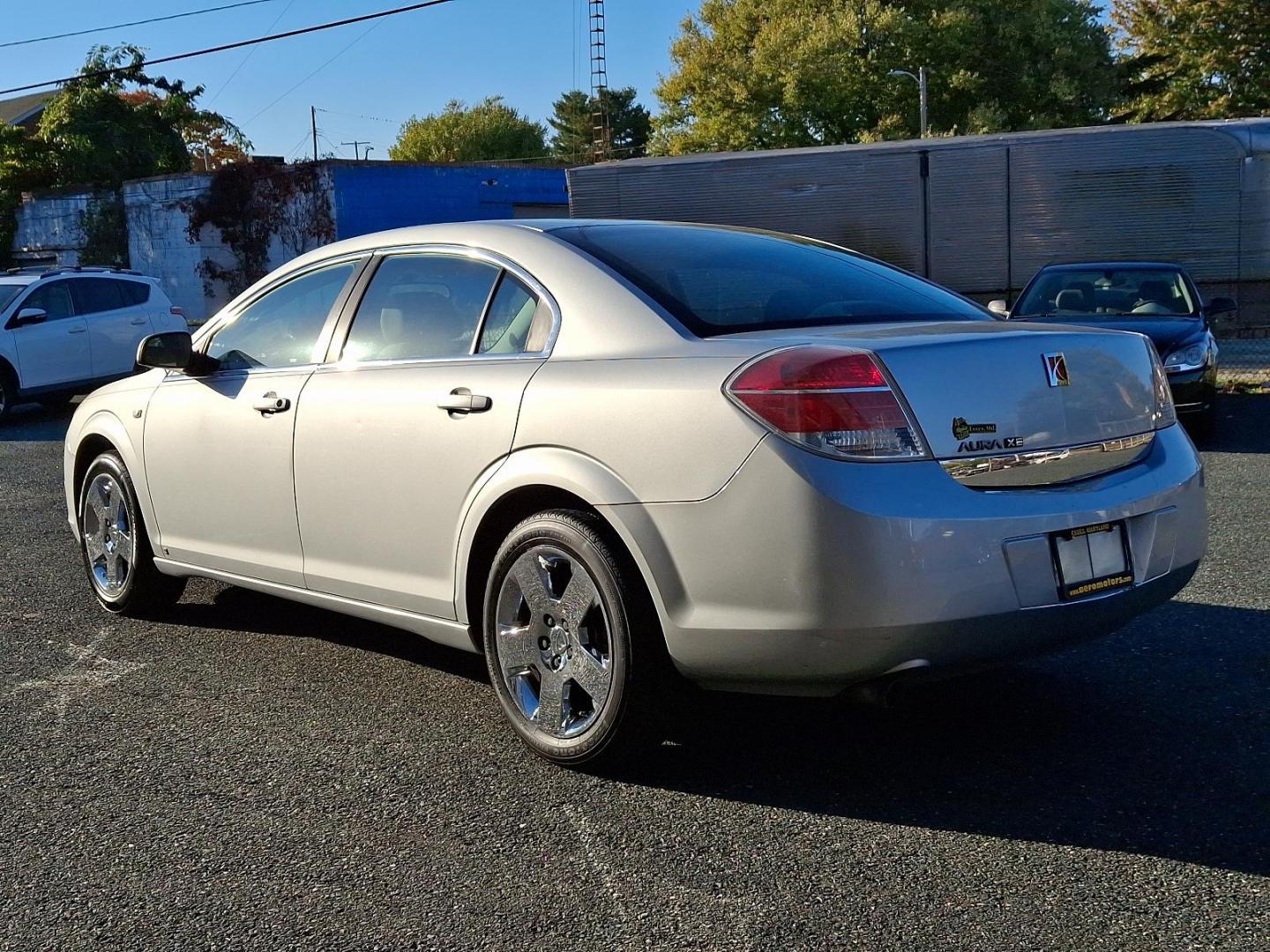 2009 Quicksilver - 17U /Gray - 85B Saturn Aura XE (1G8ZS57B99F) with an ENGINE, ECOTEC 2.4L 4-CYLINDER engine, located at 50 Eastern Blvd., Essex, MD, 21221, (410) 686-3444, 39.304367, -76.484947 - Step into the driver's seat of this sophisticated 2009 Saturn Aura XE 4dr Sdn I4 XE, an epitome of sleek design and reliable performance. Coated in an enchanting Quicksilver exterior perfectly contrasted with a nearly untouched Gray interior, this vehicle promises an exemplary blend of style and com - Photo#5