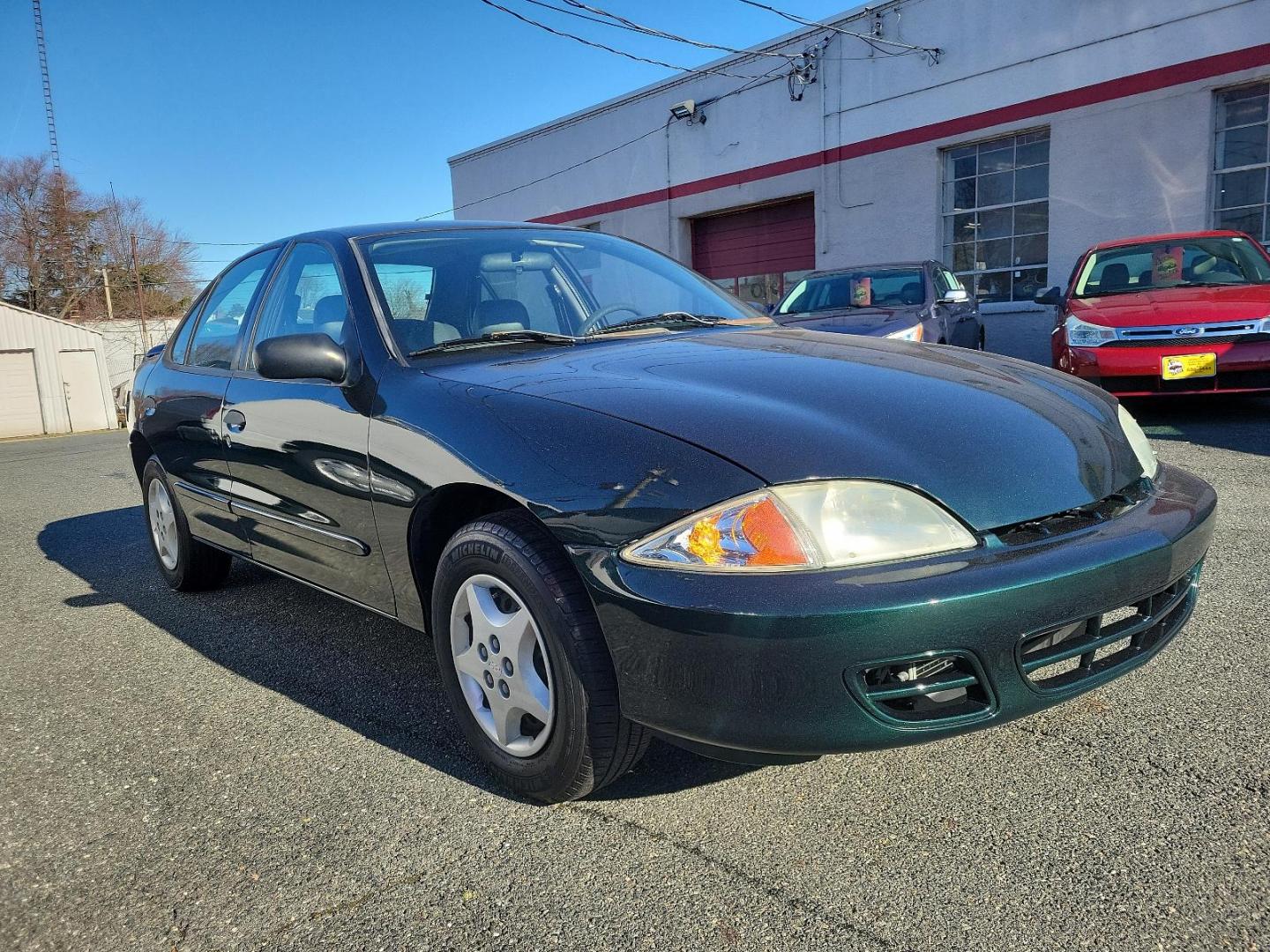 2002 Forest Green Metallic - 47U /Graphite - 12 Chevrolet Cavalier (1G1JC524327) with an 2.2L (134) SFI L4 2200 ENGINE engine, located at 50 Eastern Blvd., Essex, MD, 21221, (410) 686-3444, 39.304367, -76.484947 - Experience the appealing blend of practicality and performance in this 2002 Chevrolet Cavalier 4dr Sedan. Boasting a distinct Forest Green Metallic - 47U exterior, it turns heads with its timeless design and bold color. Plus, its Graphite - 12 interior offers uncompromised comfort and sophisticated - Photo#2