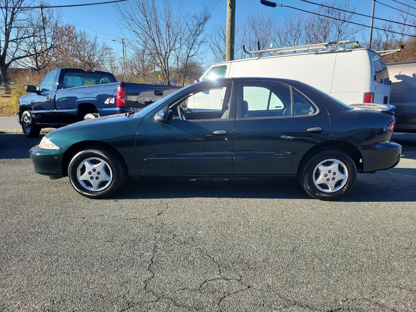 2002 Forest Green Metallic - 47U /Graphite - 12 Chevrolet Cavalier (1G1JC524327) with an 2.2L (134) SFI L4 2200 ENGINE engine, located at 50 Eastern Blvd., Essex, MD, 21221, (410) 686-3444, 39.304367, -76.484947 - Experience the appealing blend of practicality and performance in this 2002 Chevrolet Cavalier 4dr Sedan. Boasting a distinct Forest Green Metallic - 47U exterior, it turns heads with its timeless design and bold color. Plus, its Graphite - 12 interior offers uncompromised comfort and sophisticated - Photo#6