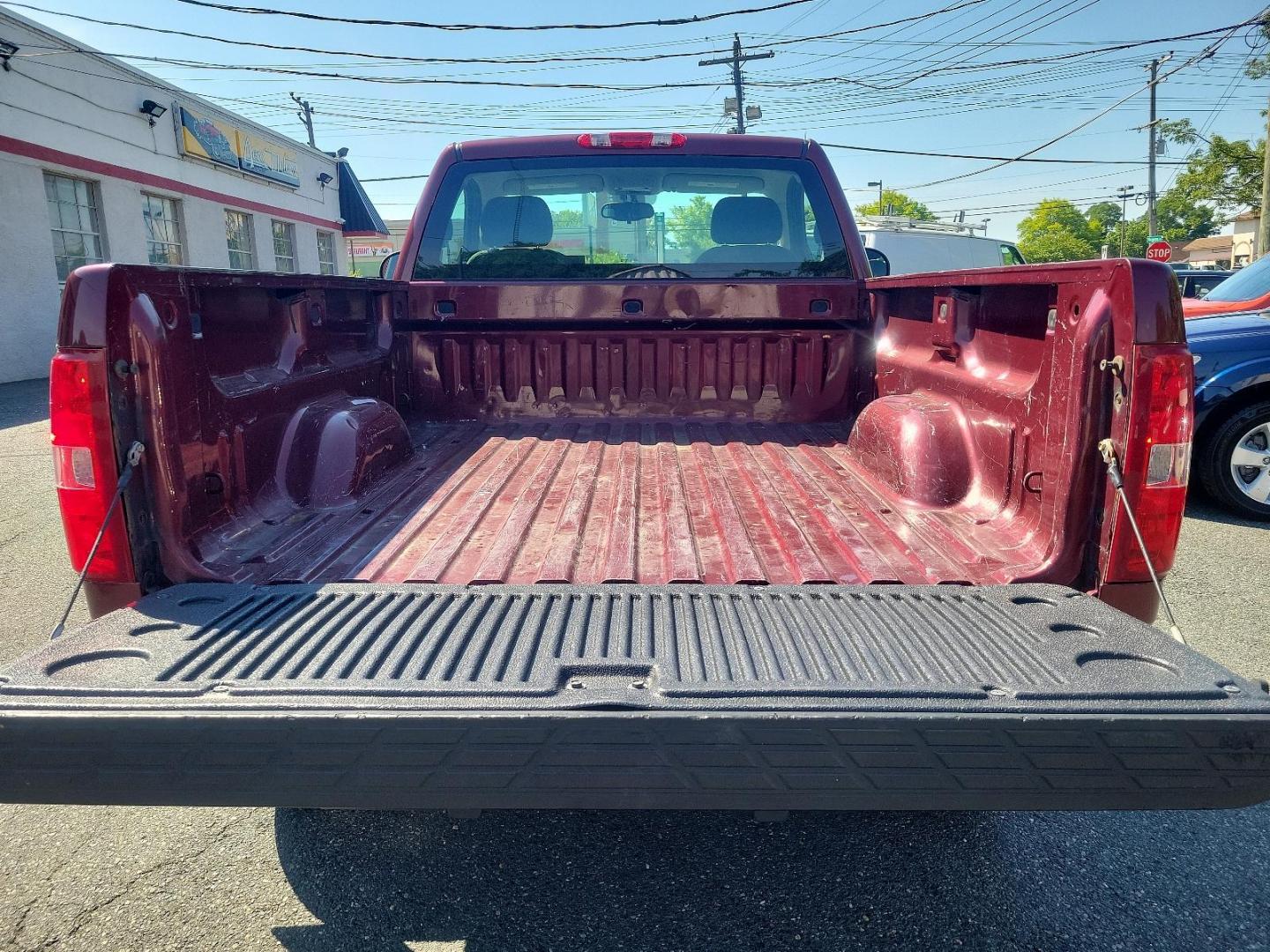 2009 Deep Ruby Metallic - 66U /Dark Titanium - 88B Chevrolet Silverado 1500 Work Truck (1GCEK14X59Z) with an ENGINE, VORTEC 4.3L V6 MFI engine, located at 50 Eastern Blvd., Essex, MD, 21221, (410) 686-3444, 39.304367, -76.484947 - Feast your eyes on this rugged 2009 Chevrolet Silverado 1500 Work Truck! Built to endure, the exterior is finished in a striking Deep Ruby Metallic (66U) which carries a touch of elegance alongside undeniable power. The interior complements the outer look beautifully, boasting a spacious Dark Titani - Photo#21