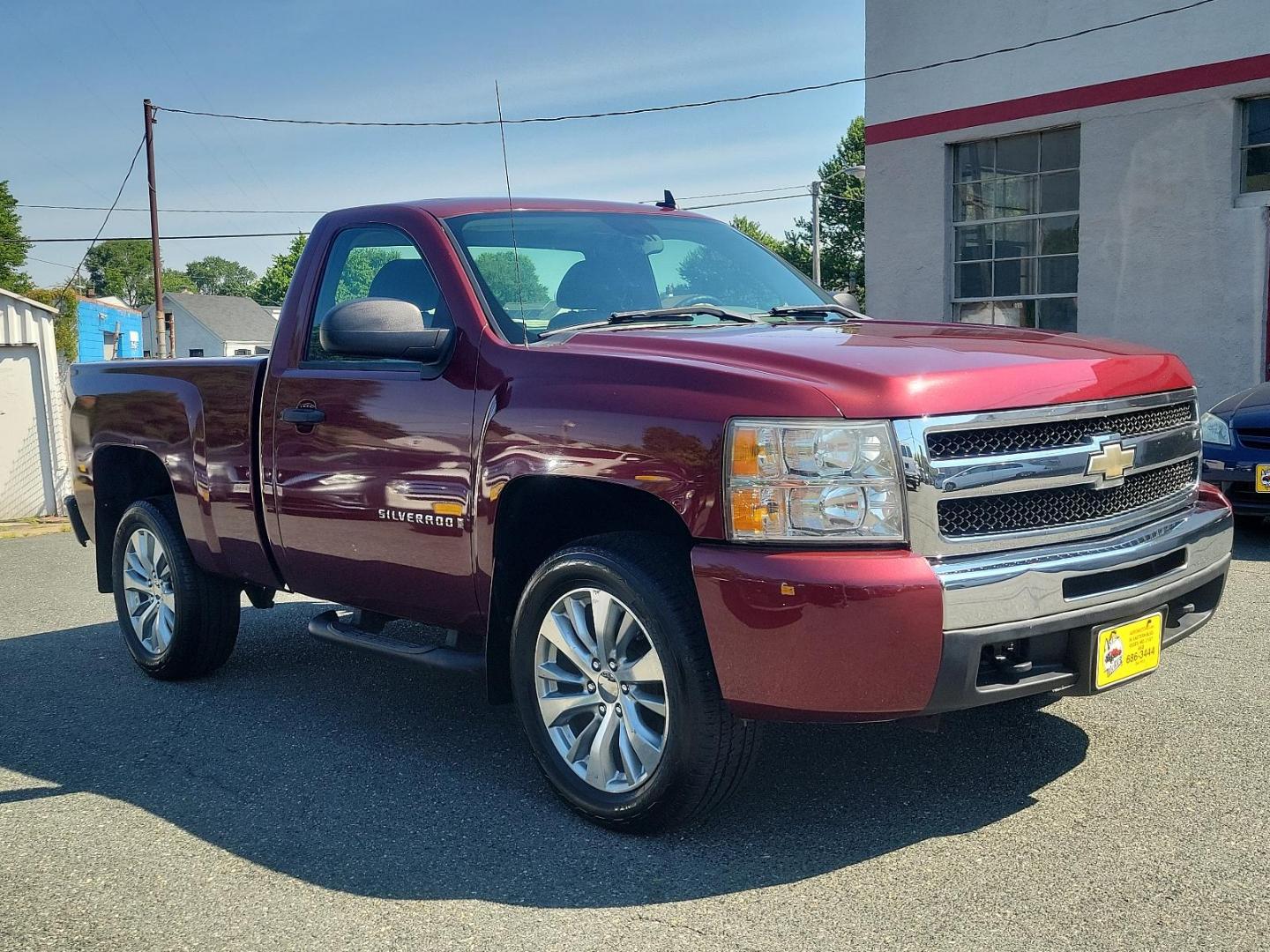 2009 Deep Ruby Metallic - 66U /Dark Titanium - 88B Chevrolet Silverado 1500 Work Truck (1GCEK14X59Z) with an ENGINE, VORTEC 4.3L V6 MFI engine, located at 50 Eastern Blvd., Essex, MD, 21221, (410) 686-3444, 39.304367, -76.484947 - Feast your eyes on this rugged 2009 Chevrolet Silverado 1500 Work Truck! Built to endure, the exterior is finished in a striking Deep Ruby Metallic (66U) which carries a touch of elegance alongside undeniable power. The interior complements the outer look beautifully, boasting a spacious Dark Titani - Photo#2