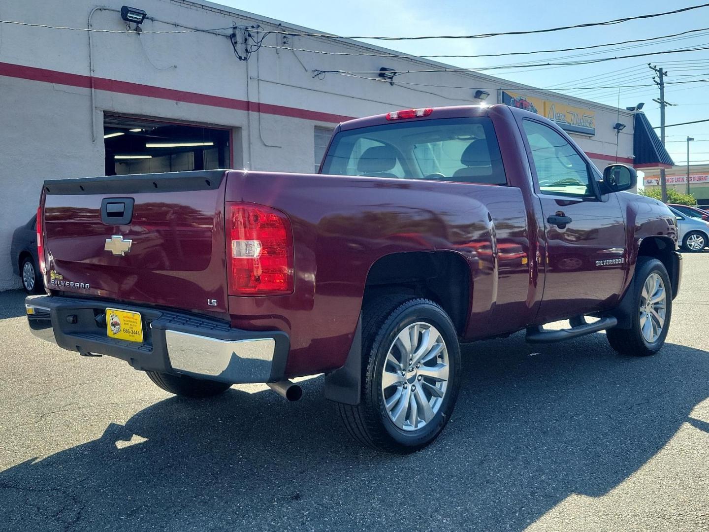 2009 Deep Ruby Metallic - 66U /Dark Titanium - 88B Chevrolet Silverado 1500 Work Truck (1GCEK14X59Z) with an ENGINE, VORTEC 4.3L V6 MFI engine, located at 50 Eastern Blvd., Essex, MD, 21221, (410) 686-3444, 39.304367, -76.484947 - Feast your eyes on this rugged 2009 Chevrolet Silverado 1500 Work Truck! Built to endure, the exterior is finished in a striking Deep Ruby Metallic (66U) which carries a touch of elegance alongside undeniable power. The interior complements the outer look beautifully, boasting a spacious Dark Titani - Photo#3