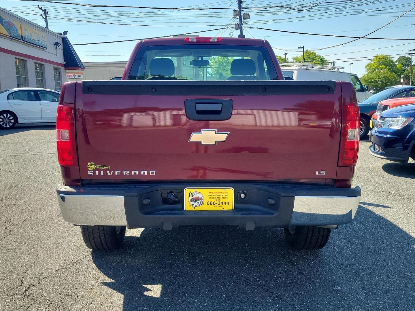 2009 Deep Ruby Metallic - 66U /Dark Titanium - 88B Chevrolet Silverado 1500 Work Truck (1GCEK14X59Z) with an ENGINE, VORTEC 4.3L V6 MFI engine, located at 50 Eastern Blvd., Essex, MD, 21221, (410) 686-3444, 39.304367, -76.484947 - Feast your eyes on this rugged 2009 Chevrolet Silverado 1500 Work Truck! Built to endure, the exterior is finished in a striking Deep Ruby Metallic (66U) which carries a touch of elegance alongside undeniable power. The interior complements the outer look beautifully, boasting a spacious Dark Titani - Photo#4