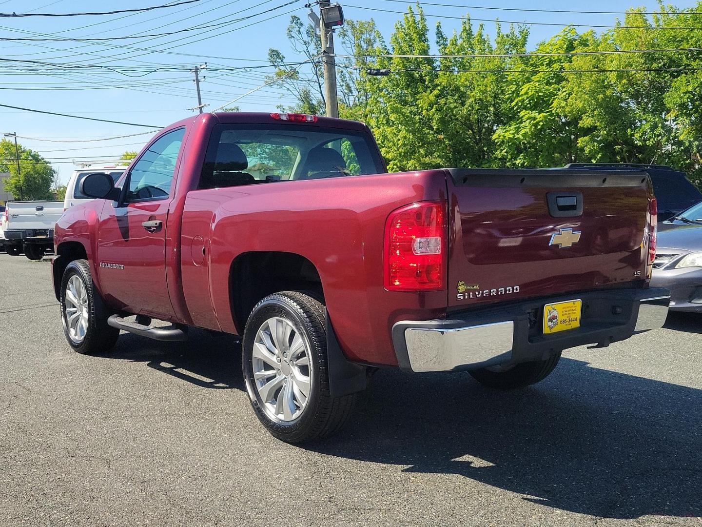 2009 Deep Ruby Metallic - 66U /Dark Titanium - 88B Chevrolet Silverado 1500 Work Truck (1GCEK14X59Z) with an ENGINE, VORTEC 4.3L V6 MFI engine, located at 50 Eastern Blvd., Essex, MD, 21221, (410) 686-3444, 39.304367, -76.484947 - Feast your eyes on this rugged 2009 Chevrolet Silverado 1500 Work Truck! Built to endure, the exterior is finished in a striking Deep Ruby Metallic (66U) which carries a touch of elegance alongside undeniable power. The interior complements the outer look beautifully, boasting a spacious Dark Titani - Photo#5