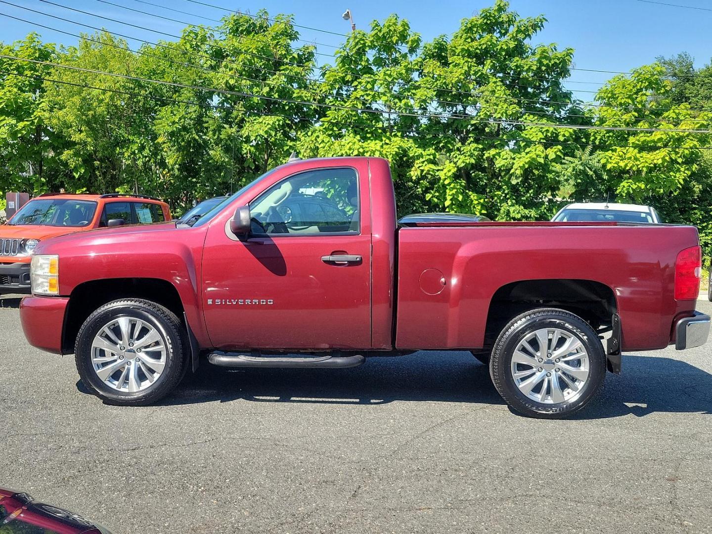 2009 Deep Ruby Metallic - 66U /Dark Titanium - 88B Chevrolet Silverado 1500 Work Truck (1GCEK14X59Z) with an ENGINE, VORTEC 4.3L V6 MFI engine, located at 50 Eastern Blvd., Essex, MD, 21221, (410) 686-3444, 39.304367, -76.484947 - Feast your eyes on this rugged 2009 Chevrolet Silverado 1500 Work Truck! Built to endure, the exterior is finished in a striking Deep Ruby Metallic (66U) which carries a touch of elegance alongside undeniable power. The interior complements the outer look beautifully, boasting a spacious Dark Titani - Photo#6