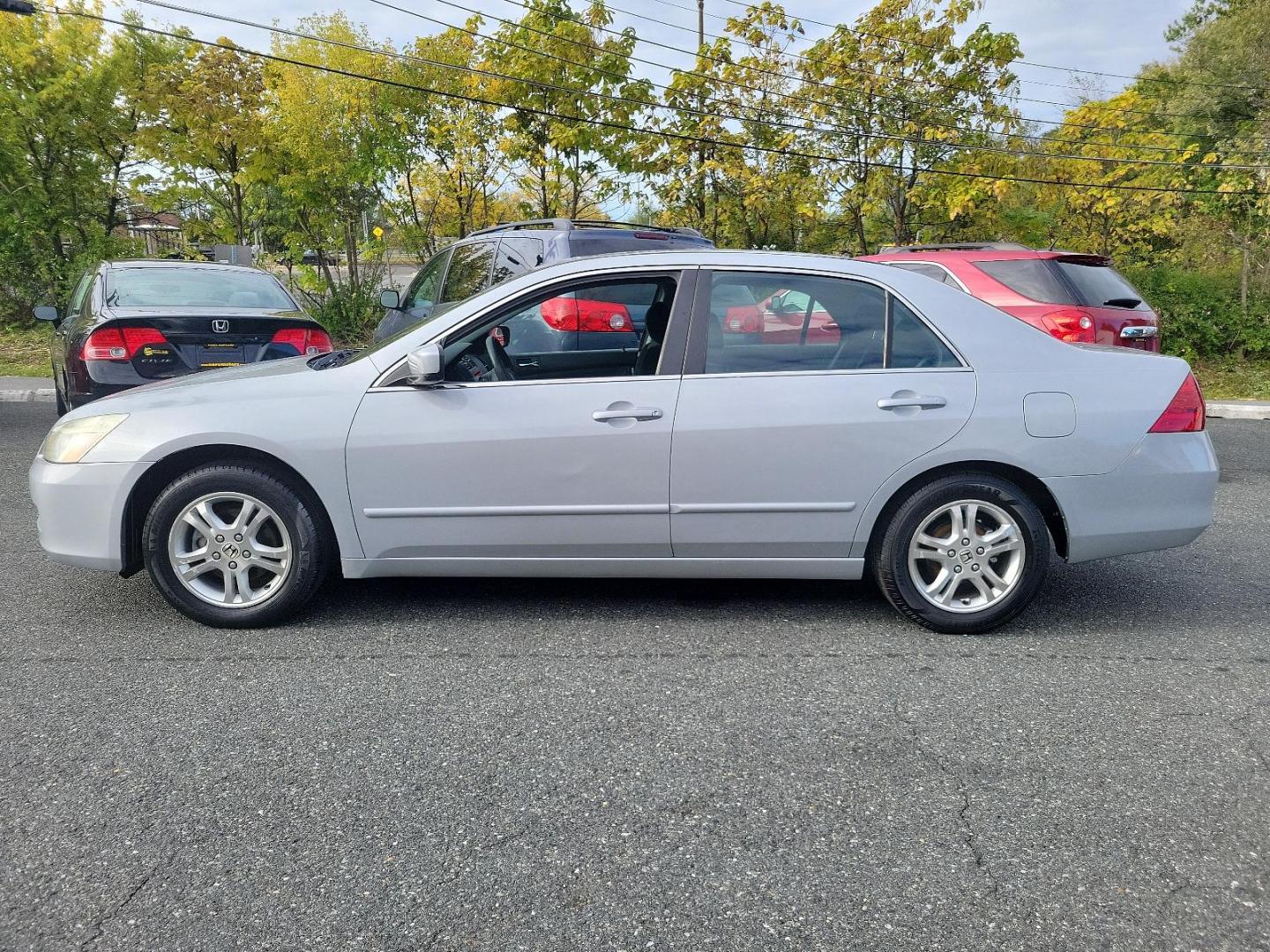 2006 Alabaster Silver Metallic - SI /Black - BK Honda Accord Sdn EX (1HGCM56766A) with an 2.4L DOHC MPFI 16-valve i-VTEC I4 engine engine, located at 50 Eastern Blvd., Essex, MD, 21221, (410) 686-3444, 39.304367, -76.484947 - Experience the synergy of comfort and reliability with this 2006 Honda Accord sedan. Dressed in a sleek silver exterior, this beauty exudes sophistication during every journey. While specific interior details are undefined, Honda is renowned for creating comfortable, highly-functional and user-frien - Photo#6