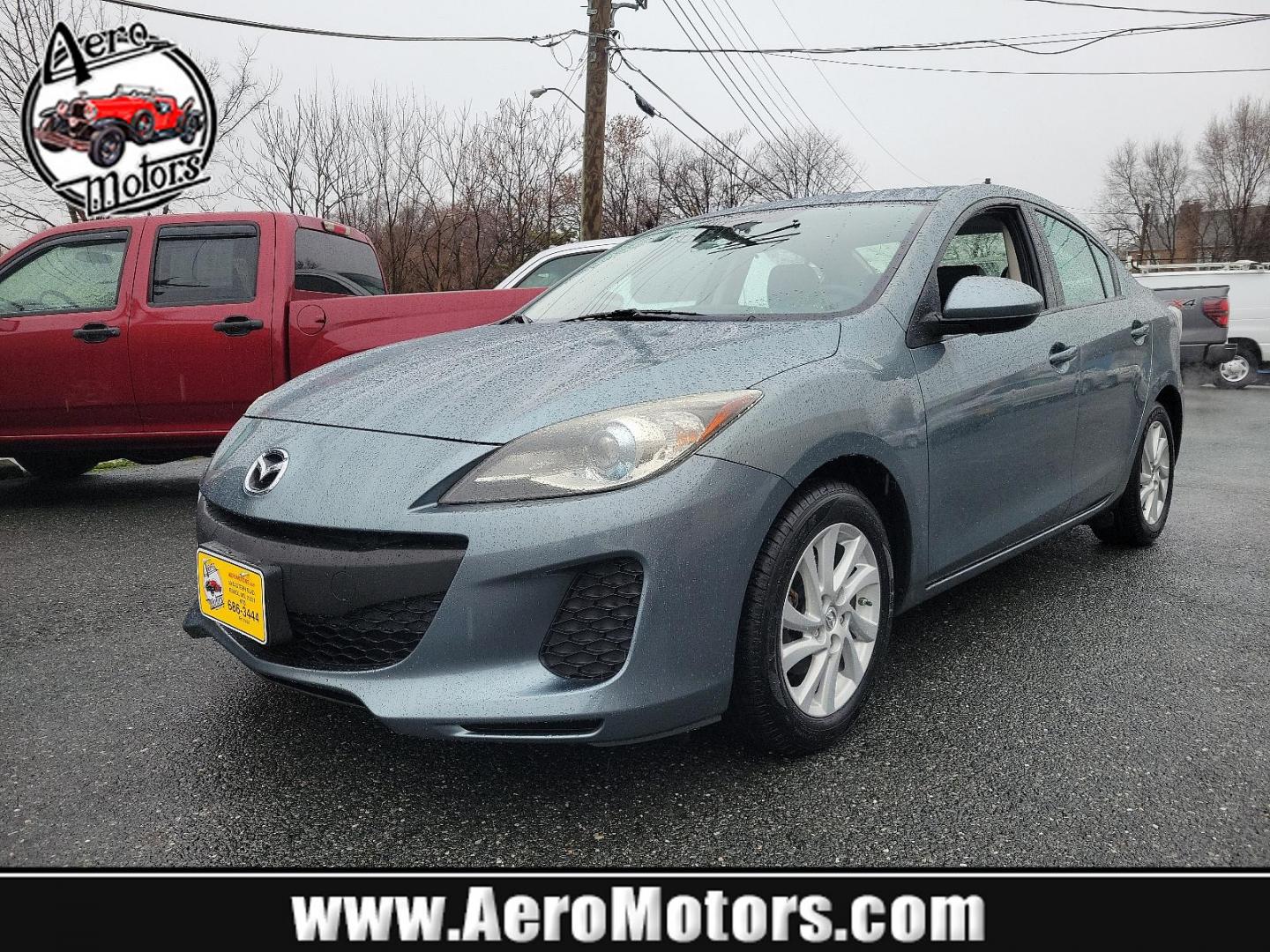 2012 Dolphin Gray Mica - 39T /Black - BU4 Mazda Mazda3 i Grand Touring (JM1BL1W88C1) with an 2.0L DOHC 16-valve SKYACTIV-G I4 engine -inc: variable valve timing (VVT) engine, located at 50 Eastern Blvd., Essex, MD, 21221, (410) 686-3444, 39.304367, -76.484947 - Discover the thrilling ride of the 2012 Mazda Mazda3 i Grand Touring 4dr Sedan Auto i Grand Touring. This vehicle showcases a sleek Dolphin Gray Mica-39T exterior, elegantly complemented by a sophisticated Black-BU4 interior that underlines its timeless appeal. Under the hood, you'll find the robust - Photo#0