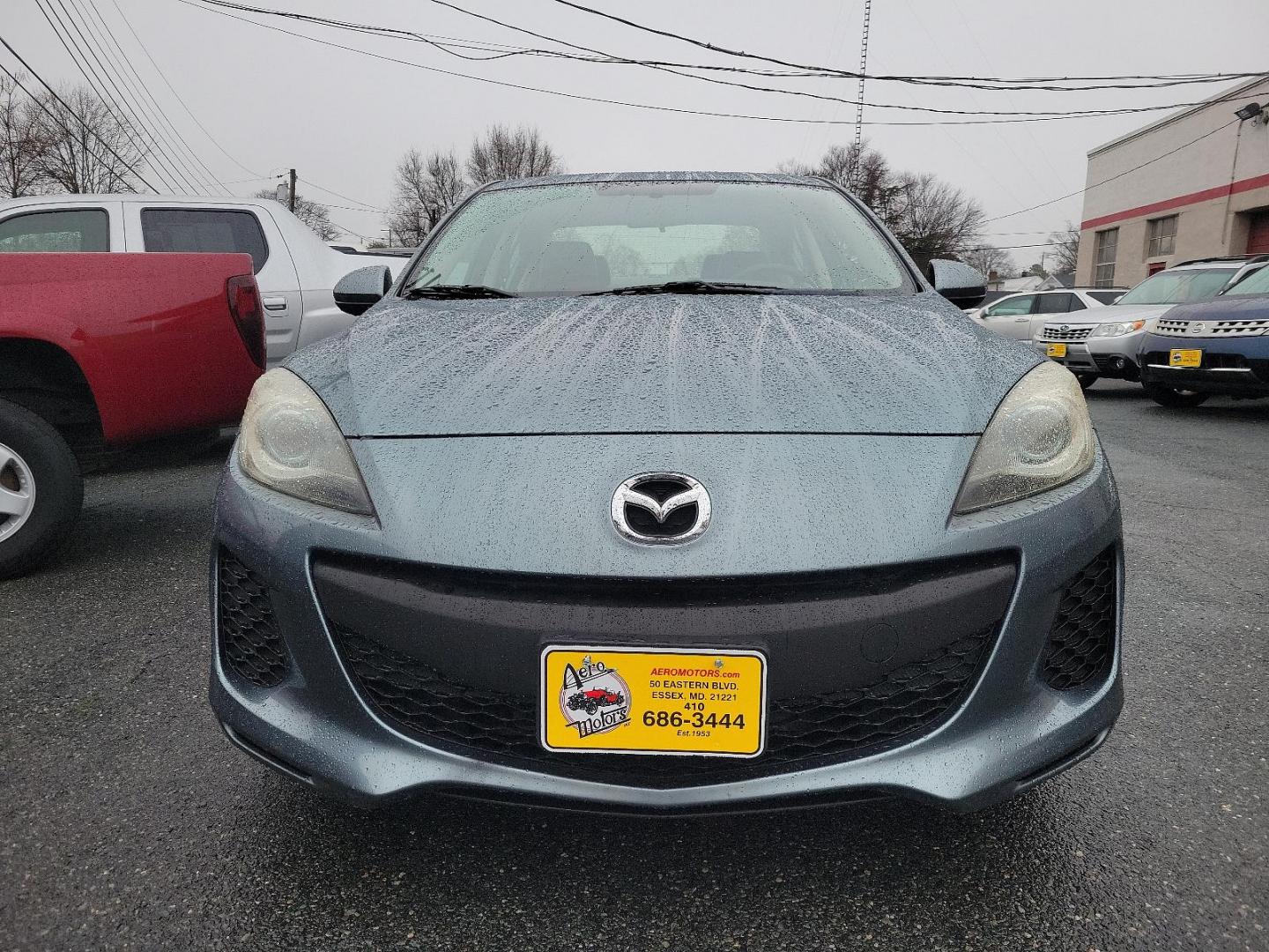 2012 Dolphin Gray Mica - 39T /Black - BU4 Mazda Mazda3 i Grand Touring (JM1BL1W88C1) with an 2.0L DOHC 16-valve SKYACTIV-G I4 engine -inc: variable valve timing (VVT) engine, located at 50 Eastern Blvd., Essex, MD, 21221, (410) 686-3444, 39.304367, -76.484947 - Discover the thrilling ride of the 2012 Mazda Mazda3 i Grand Touring 4dr Sedan Auto i Grand Touring. This vehicle showcases a sleek Dolphin Gray Mica-39T exterior, elegantly complemented by a sophisticated Black-BU4 interior that underlines its timeless appeal. Under the hood, you'll find the robust - Photo#1