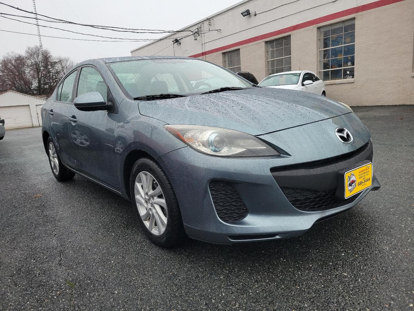 2012 Dolphin Gray Mica - 39T /Black - BU4 Mazda Mazda3 i Grand Touring (JM1BL1W88C1) with an 2.0L DOHC 16-valve SKYACTIV-G I4 engine -inc: variable valve timing (VVT) engine, located at 50 Eastern Blvd., Essex, MD, 21221, (410) 686-3444, 39.304367, -76.484947 - Discover the thrilling ride of the 2012 Mazda Mazda3 i Grand Touring 4dr Sedan Auto i Grand Touring. This vehicle showcases a sleek Dolphin Gray Mica-39T exterior, elegantly complemented by a sophisticated Black-BU4 interior that underlines its timeless appeal. Under the hood, you'll find the robust - Photo#2