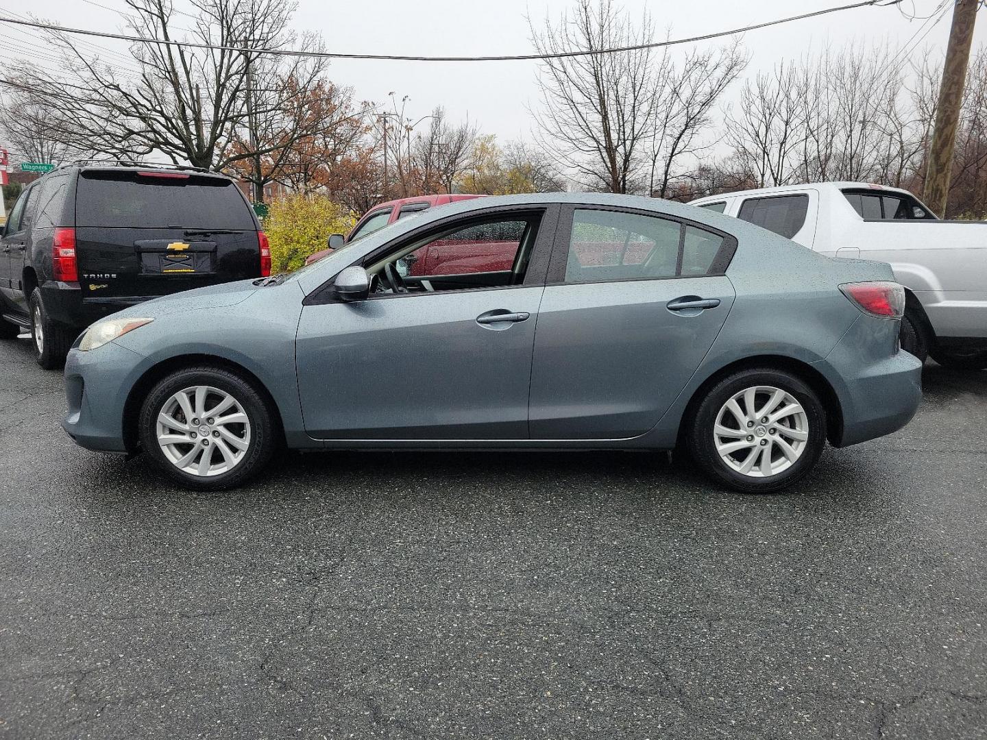 2012 Dolphin Gray Mica - 39T /Black - BU4 Mazda Mazda3 i Grand Touring (JM1BL1W88C1) with an 2.0L DOHC 16-valve SKYACTIV-G I4 engine -inc: variable valve timing (VVT) engine, located at 50 Eastern Blvd., Essex, MD, 21221, (410) 686-3444, 39.304367, -76.484947 - Discover the thrilling ride of the 2012 Mazda Mazda3 i Grand Touring 4dr Sedan Auto i Grand Touring. This vehicle showcases a sleek Dolphin Gray Mica-39T exterior, elegantly complemented by a sophisticated Black-BU4 interior that underlines its timeless appeal. Under the hood, you'll find the robust - Photo#6