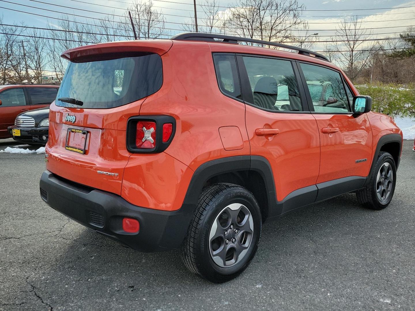 2016 Omaha Orange - PKP /Black - A7X9 Jeep Renegade Sport (ZACCJBAT1GP) with an ENGINE: 2.4L I4 MULTIAIR engine, located at 50 Eastern Blvd., Essex, MD, 21221, (410) 686-3444, 39.304367, -76.484947 - Introducing the 2016 Jeep Renegade Sport 4WD 4dr Sport, a striking silhouette presenting a pure embodiment of the adventurous spirit inherent to the Jeep Brand. Exuding strength and confidence, its Omaha Orange - PKP exterior immediately demands attention with its distinctive rugged appeal. This m - Photo#3