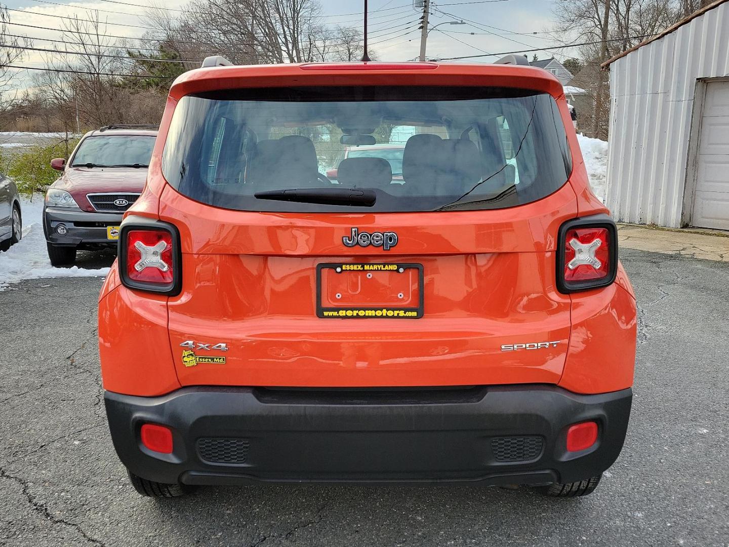 2016 Omaha Orange - PKP /Black - A7X9 Jeep Renegade Sport (ZACCJBAT1GP) with an ENGINE: 2.4L I4 MULTIAIR engine, located at 50 Eastern Blvd., Essex, MD, 21221, (410) 686-3444, 39.304367, -76.484947 - Introducing the 2016 Jeep Renegade Sport 4WD 4dr Sport, a striking silhouette presenting a pure embodiment of the adventurous spirit inherent to the Jeep Brand. Exuding strength and confidence, its Omaha Orange - PKP exterior immediately demands attention with its distinctive rugged appeal. This m - Photo#4