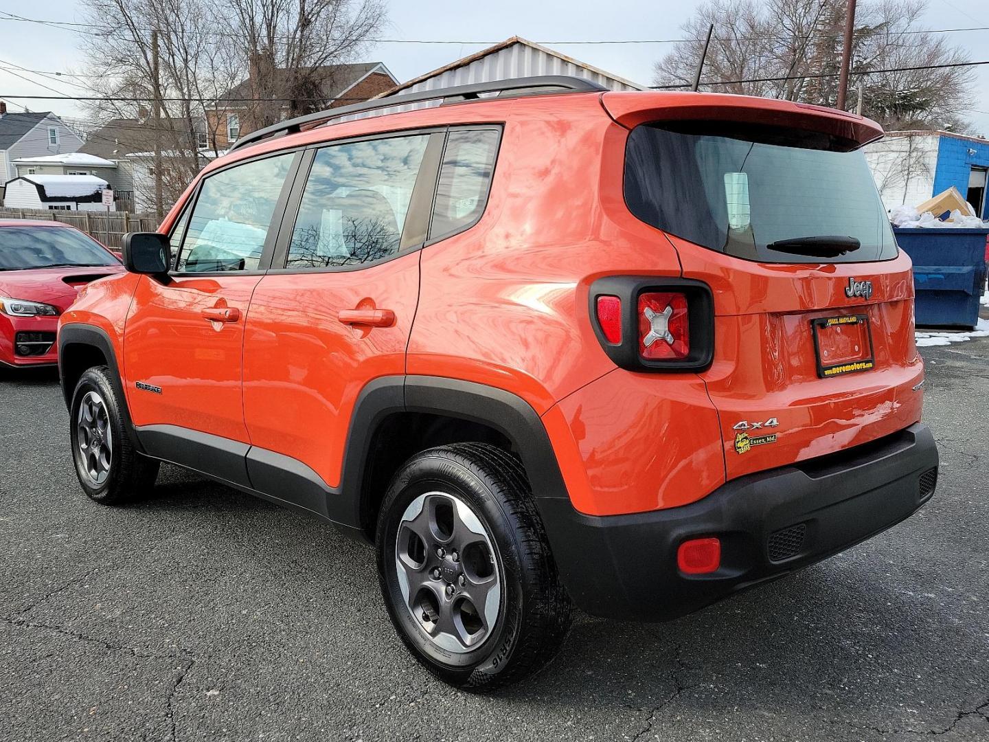 2016 Omaha Orange - PKP /Black - A7X9 Jeep Renegade Sport (ZACCJBAT1GP) with an ENGINE: 2.4L I4 MULTIAIR engine, located at 50 Eastern Blvd., Essex, MD, 21221, (410) 686-3444, 39.304367, -76.484947 - Introducing the 2016 Jeep Renegade Sport 4WD 4dr Sport, a striking silhouette presenting a pure embodiment of the adventurous spirit inherent to the Jeep Brand. Exuding strength and confidence, its Omaha Orange - PKP exterior immediately demands attention with its distinctive rugged appeal. This m - Photo#5