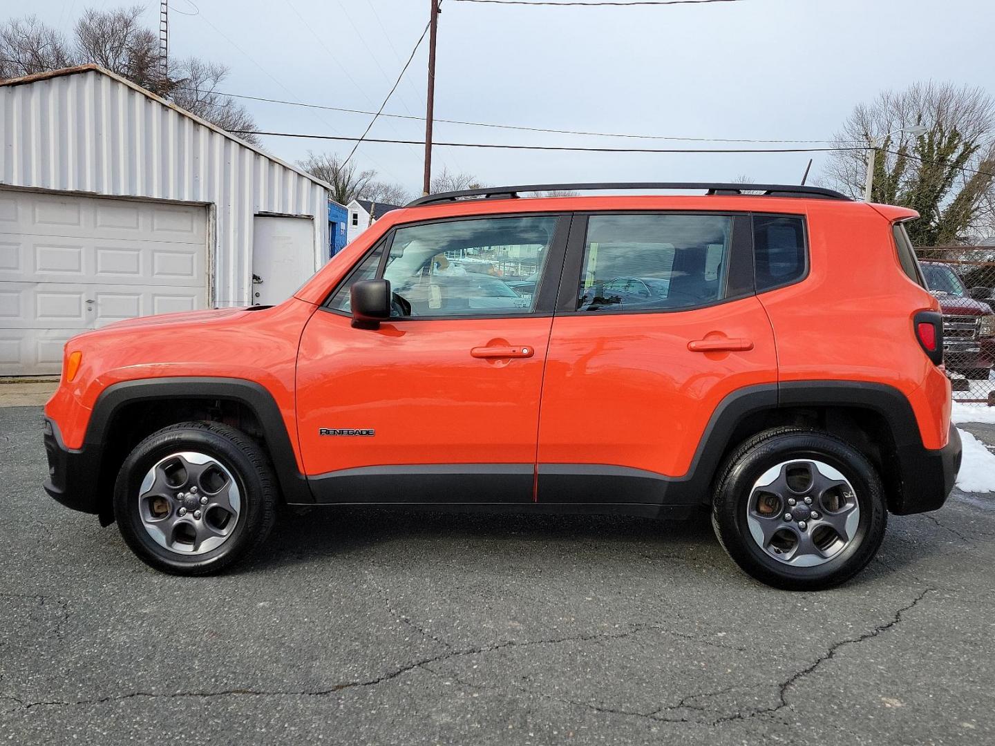 2016 Omaha Orange - PKP /Black - A7X9 Jeep Renegade Sport (ZACCJBAT1GP) with an ENGINE: 2.4L I4 MULTIAIR engine, located at 50 Eastern Blvd., Essex, MD, 21221, (410) 686-3444, 39.304367, -76.484947 - Introducing the 2016 Jeep Renegade Sport 4WD 4dr Sport, a striking silhouette presenting a pure embodiment of the adventurous spirit inherent to the Jeep Brand. Exuding strength and confidence, its Omaha Orange - PKP exterior immediately demands attention with its distinctive rugged appeal. This m - Photo#6