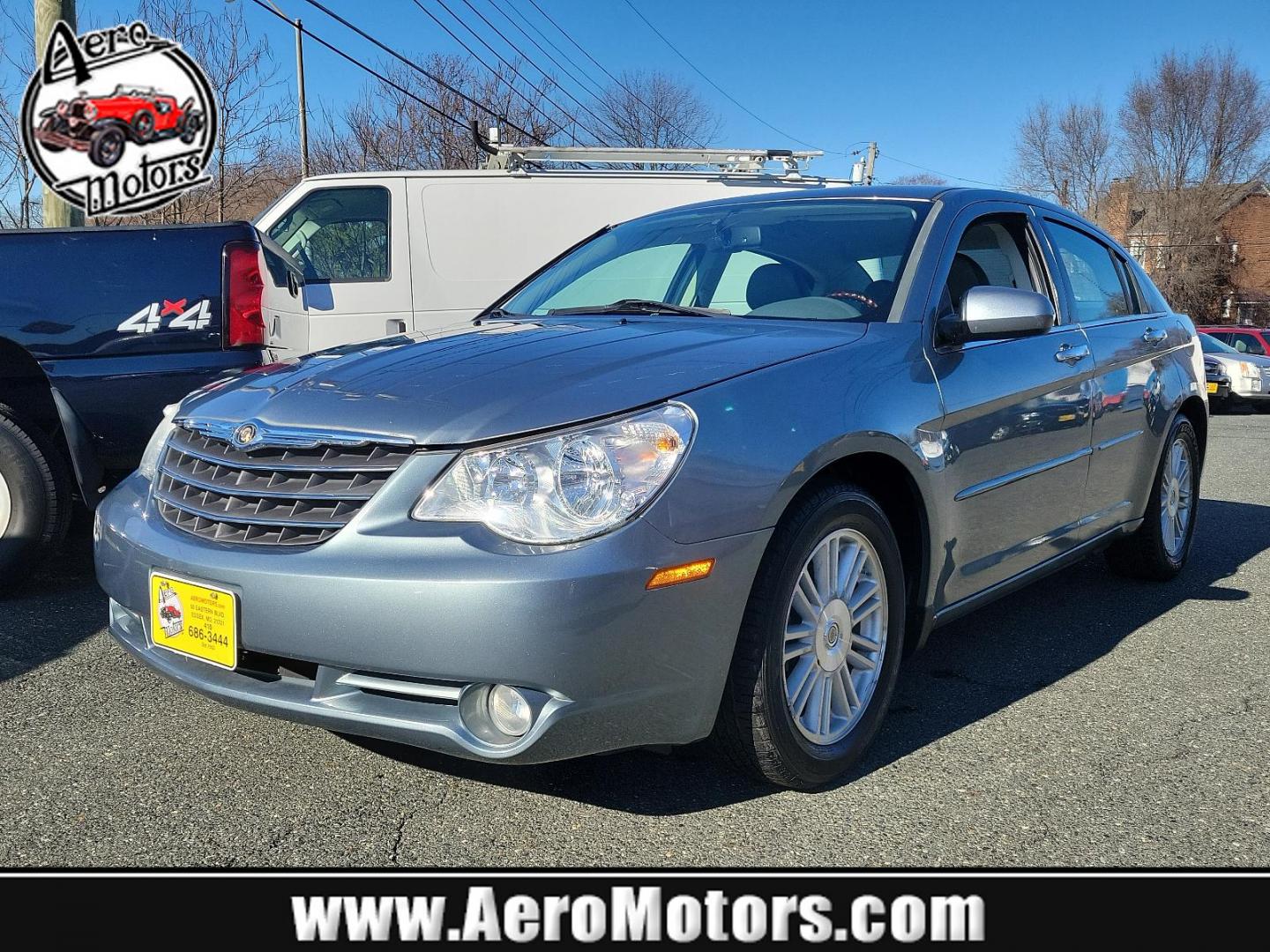 2007 Silver Steel Metallic - PA4 /Dark/Light Slate Gray - DB Chrysler Sebring Sdn Limited (1C3LC66K57N) with an 2.4L SMPI DOHC 16-VALVE I4 DUAL VVT ENGINE engine, located at 50 Eastern Blvd., Essex, MD, 21221, (410) 686-3444, 39.304367, -76.484947 - Discover the perfect blend of style, comfort and performance with this 2007 Chrysler Sebring Sdn Limited 4dr. Finished in an alluring Silver Steel Metallic - PA4 exterior paired beautifully with the plush Dark/Light Slate Gray - DB interior, it exhibits a sleek, chic aesthetic that's sure to turn he - Photo#0