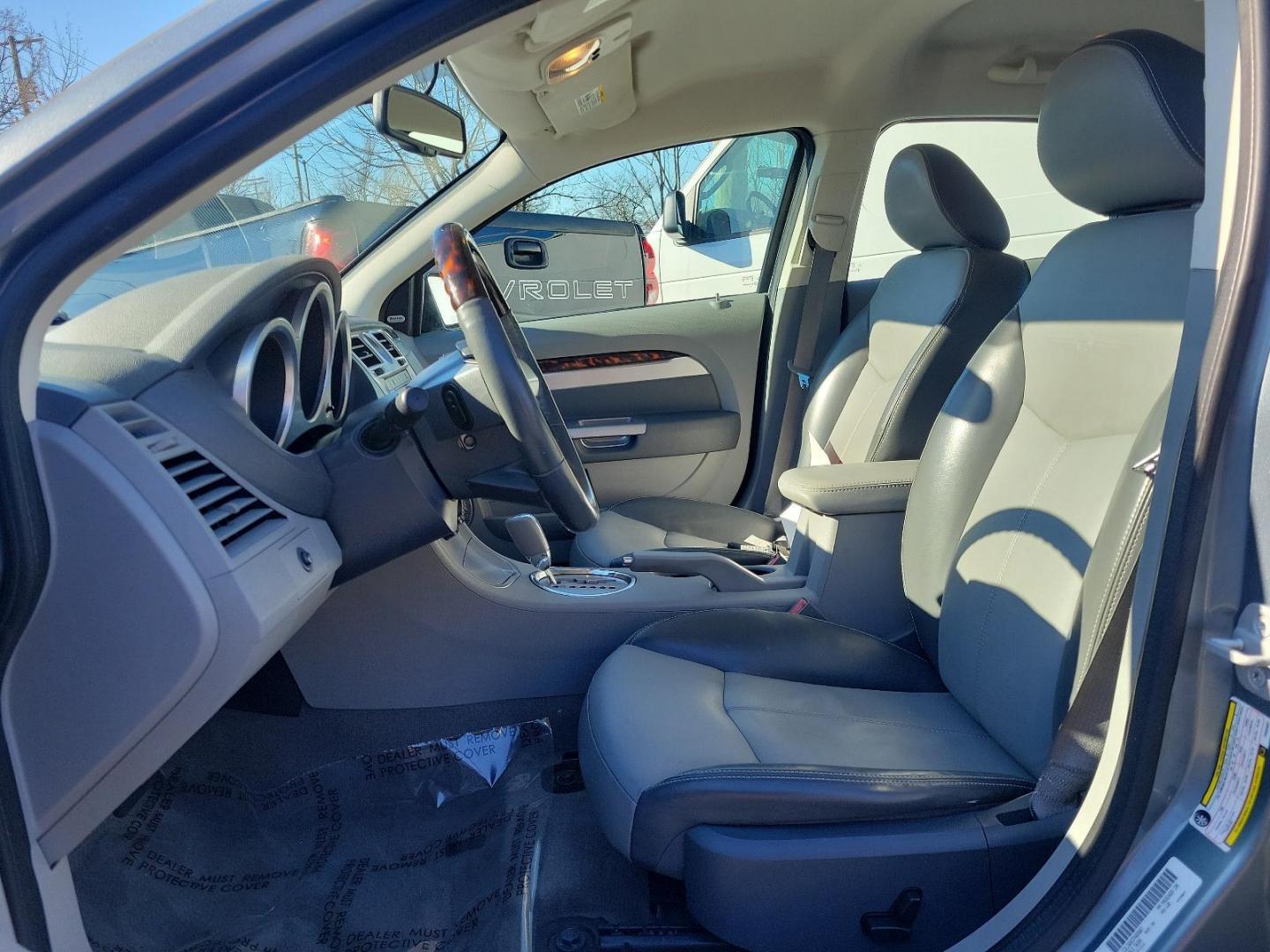 2007 Silver Steel Metallic - PA4 /Dark/Light Slate Gray - DB Chrysler Sebring Sdn Limited (1C3LC66K57N) with an 2.4L SMPI DOHC 16-VALVE I4 DUAL VVT ENGINE engine, located at 50 Eastern Blvd., Essex, MD, 21221, (410) 686-3444, 39.304367, -76.484947 - Discover the perfect blend of style, comfort and performance with this 2007 Chrysler Sebring Sdn Limited 4dr. Finished in an alluring Silver Steel Metallic - PA4 exterior paired beautifully with the plush Dark/Light Slate Gray - DB interior, it exhibits a sleek, chic aesthetic that's sure to turn he - Photo#12