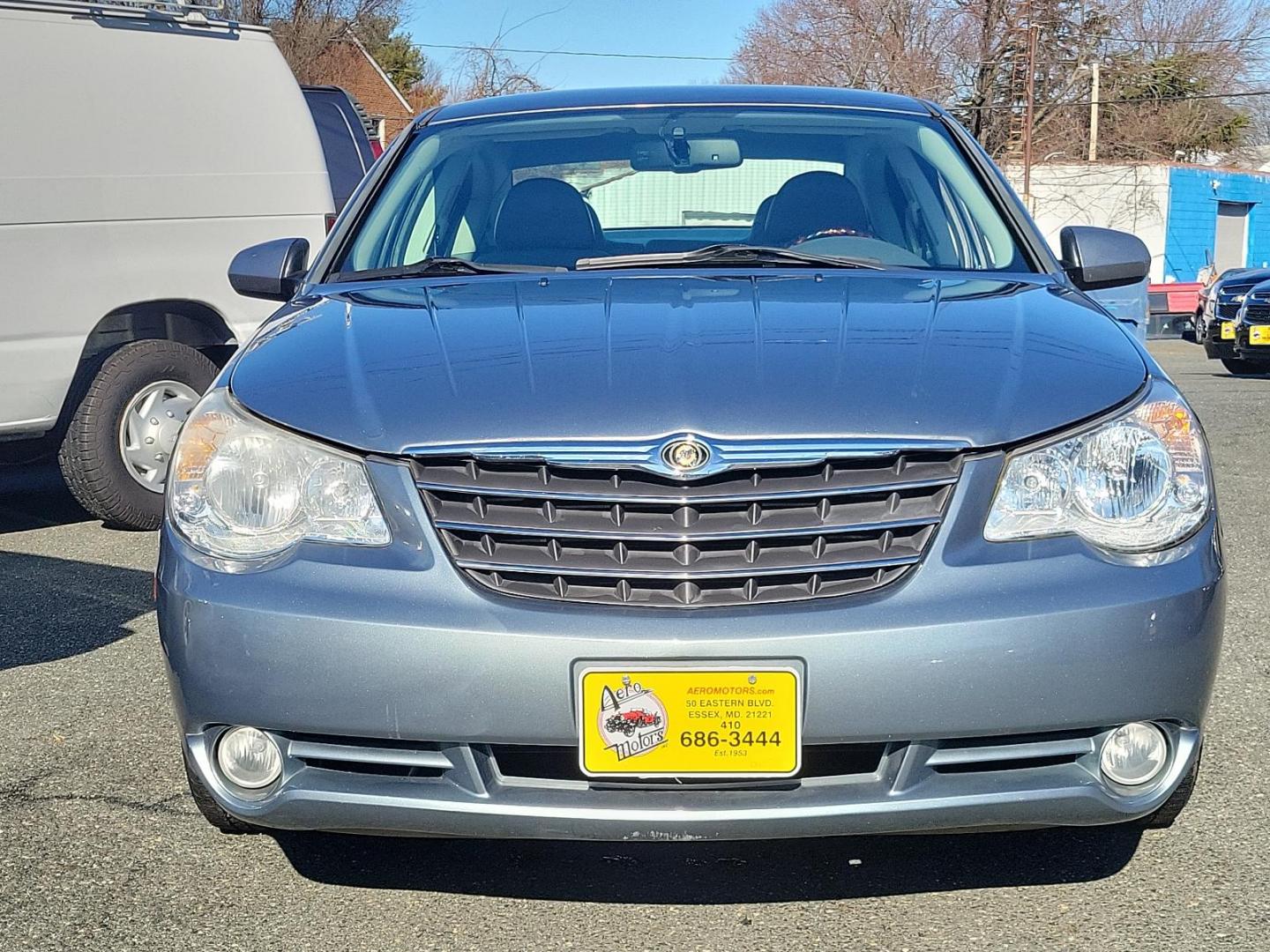 2007 Silver Steel Metallic - PA4 /Dark/Light Slate Gray - DB Chrysler Sebring Sdn Limited (1C3LC66K57N) with an 2.4L SMPI DOHC 16-VALVE I4 DUAL VVT ENGINE engine, located at 50 Eastern Blvd., Essex, MD, 21221, (410) 686-3444, 39.304367, -76.484947 - Discover the perfect blend of style, comfort and performance with this 2007 Chrysler Sebring Sdn Limited 4dr. Finished in an alluring Silver Steel Metallic - PA4 exterior paired beautifully with the plush Dark/Light Slate Gray - DB interior, it exhibits a sleek, chic aesthetic that's sure to turn he - Photo#1