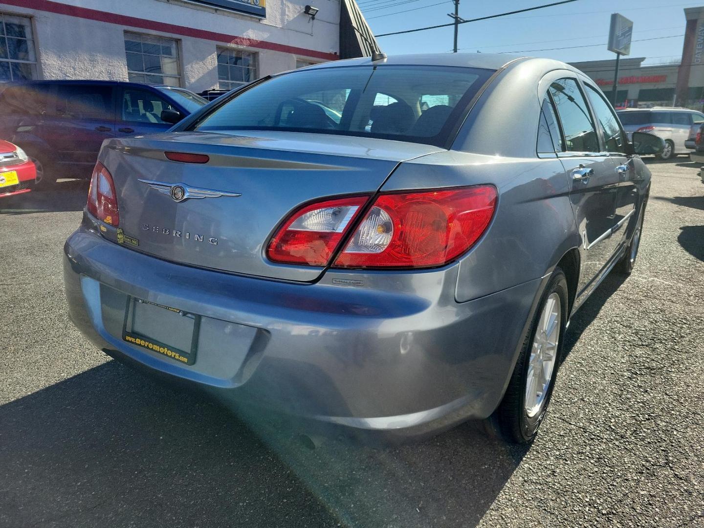 2007 Silver Steel Metallic - PA4 /Dark/Light Slate Gray - DB Chrysler Sebring Sdn Limited (1C3LC66K57N) with an 2.4L SMPI DOHC 16-VALVE I4 DUAL VVT ENGINE engine, located at 50 Eastern Blvd., Essex, MD, 21221, (410) 686-3444, 39.304367, -76.484947 - Discover the perfect blend of style, comfort and performance with this 2007 Chrysler Sebring Sdn Limited 4dr. Finished in an alluring Silver Steel Metallic - PA4 exterior paired beautifully with the plush Dark/Light Slate Gray - DB interior, it exhibits a sleek, chic aesthetic that's sure to turn he - Photo#3