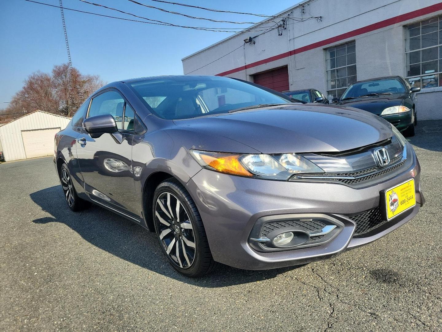 2015 Modern Steel Metallic - GX /Gray - GR Honda Civic Coupe EX-L (2HGFG3B05FH) with an Engine: 1.8L I-4 SOHC 16-Valve i-VTEC engine, located at 50 Eastern Blvd., Essex, MD, 21221, (410) 686-3444, 39.304367, -76.484947 - Experience superior performance and stylish comfort with the 2015 Honda Civic Coupe EX-L. Dressed elegantly in a modern steel metallic GX exterior, this coupe boasts a slick design that never goes unnoticed. Its inviting interior is swathed in refined gray tones, presenting a harmonious blend of sty - Photo#2