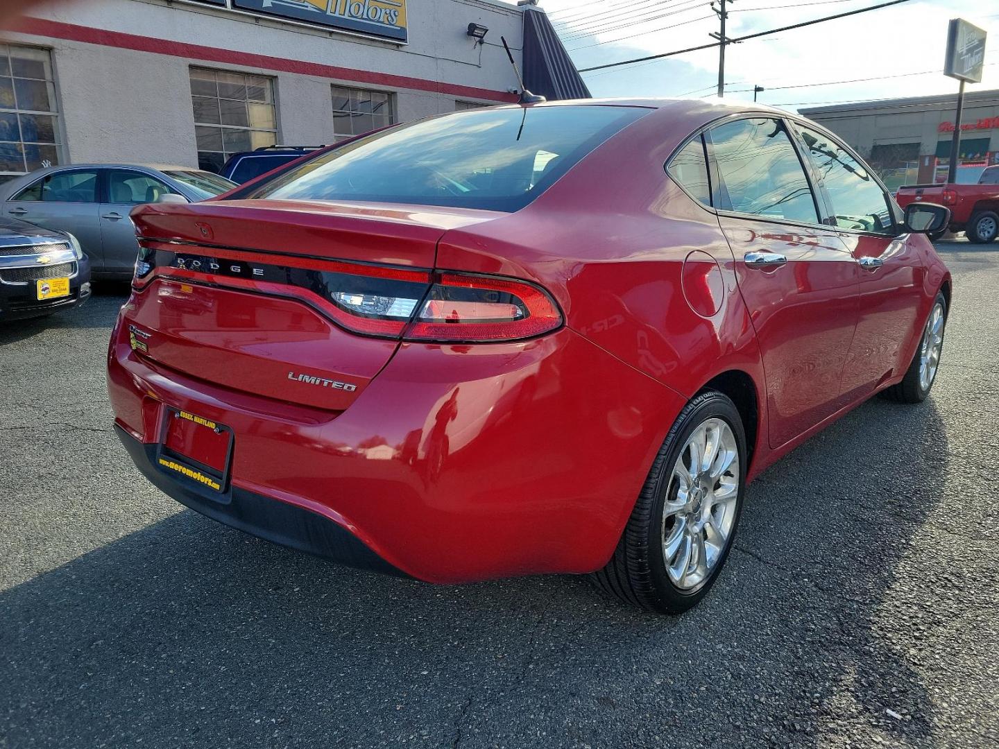 2013 Redline 2-Coat Pearl - PRM /Black - E7X9 Dodge Dart Limited (1C3CDFCA4DD) with an 2.0L I4 DOHC ENGINE engine, located at 50 Eastern Blvd., Essex, MD, 21221, (410) 686-3444, 39.304367, -76.484947 - Experience the perfect combination of power, style, and comfort with this 2013 Dodge Dart Limited 4dr sdn limited. Showcased in a vibrant Redline 2-coat Pearl Exterior with a sleek black interior, it is sure to make a bold statement on any road. Under the hood lies a robust 2.0L I4 DOHC Engine promi - Photo#3