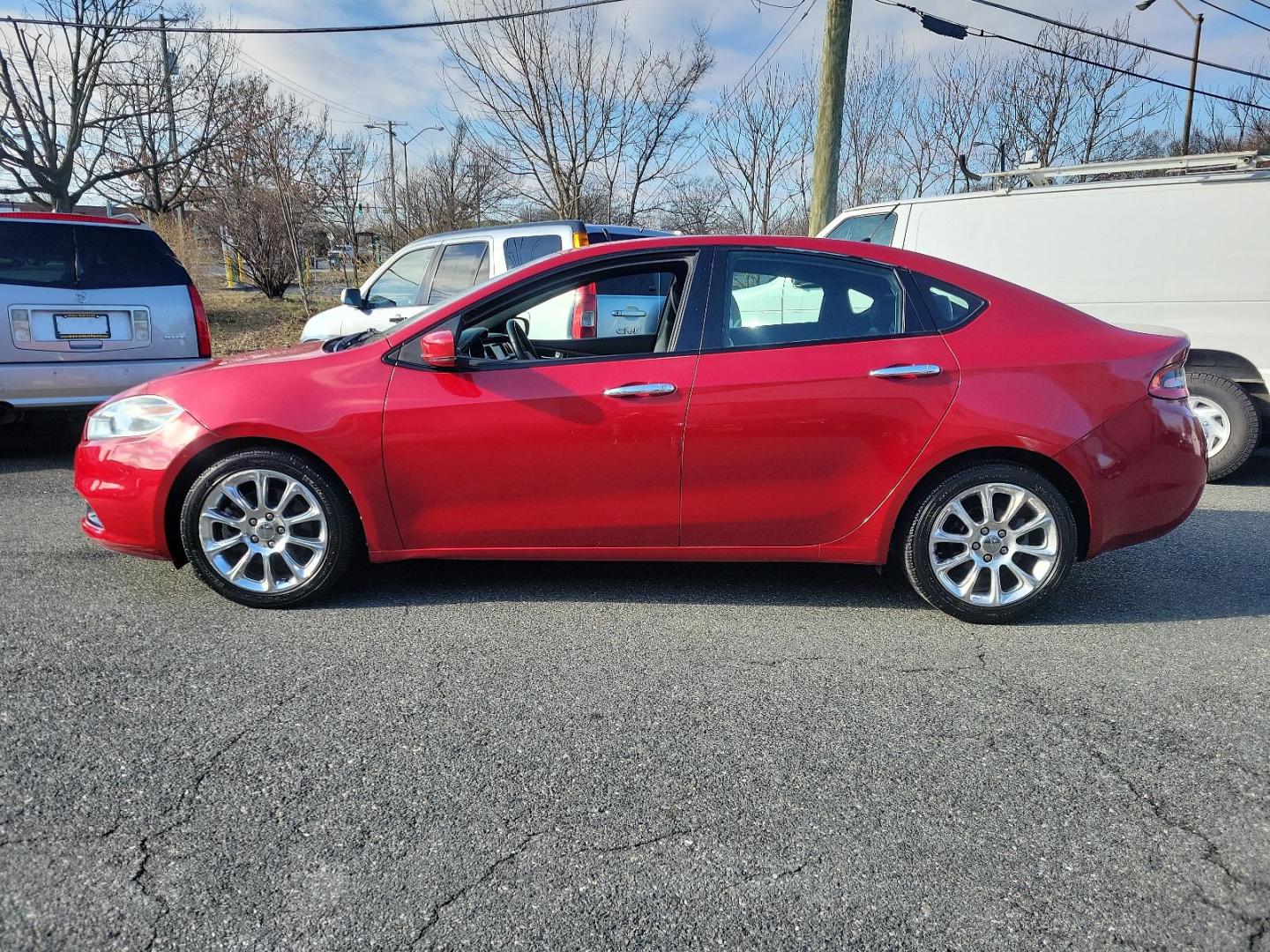 2013 Redline 2-Coat Pearl - PRM /Black - E7X9 Dodge Dart Limited (1C3CDFCA4DD) with an 2.0L I4 DOHC ENGINE engine, located at 50 Eastern Blvd., Essex, MD, 21221, (410) 686-3444, 39.304367, -76.484947 - Experience the perfect combination of power, style, and comfort with this 2013 Dodge Dart Limited 4dr sdn limited. Showcased in a vibrant Redline 2-coat Pearl Exterior with a sleek black interior, it is sure to make a bold statement on any road. Under the hood lies a robust 2.0L I4 DOHC Engine promi - Photo#6