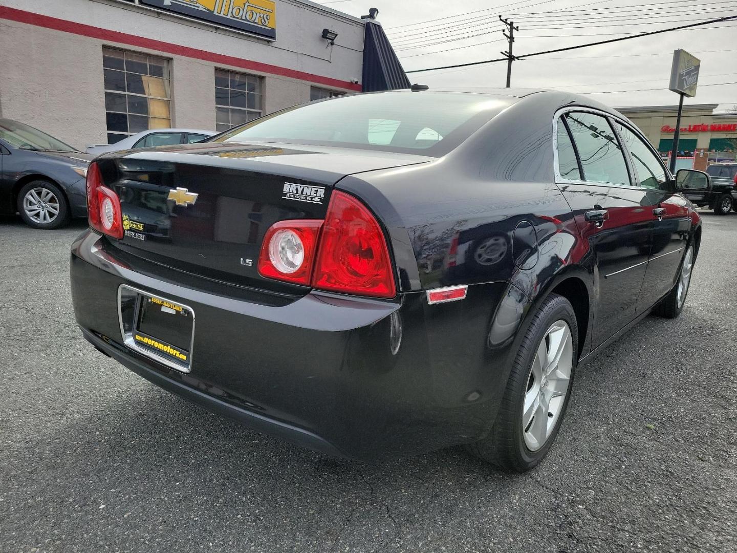 2009 Black Granite Metallic - 58U /Titanium - 83B Chevrolet Malibu LS w/1LS (1G1ZG57BX94) with an ENGINE, ECOTEC 2.4L DOHC, 16-VALVE, 4-CYLINDER VARIABLE VALVE TIMING MFI engine, located at 50 Eastern Blvd., Essex, MD, 21221, (410) 686-3444, 39.304367, -76.484947 - Experience the prowess of expert engineering with the 2009 Chevrolet Malibu LS w/1LS 4dr sdn ls w/1ls. It's not just a car but a statement on wheels. Coated in glossy black granite metallic - 58U exterior complemented by a classy titanium - 83B interior, this car embodies sophistication. The aesthet - Photo#3