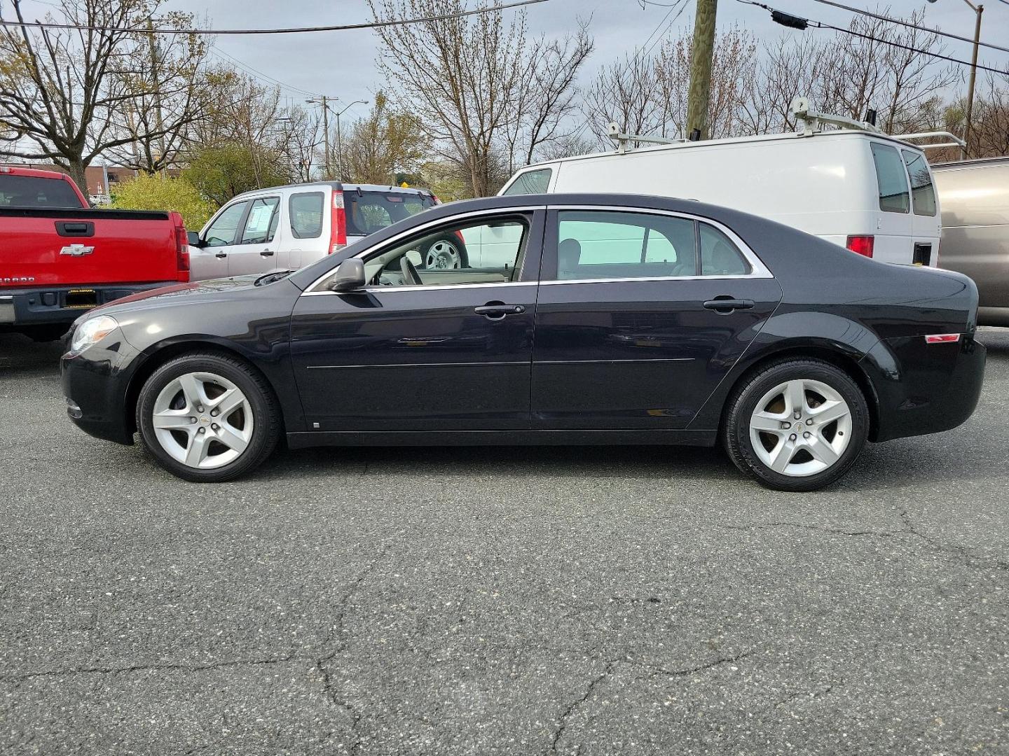 2009 Black Granite Metallic - 58U /Titanium - 83B Chevrolet Malibu LS w/1LS (1G1ZG57BX94) with an ENGINE, ECOTEC 2.4L DOHC, 16-VALVE, 4-CYLINDER VARIABLE VALVE TIMING MFI engine, located at 50 Eastern Blvd., Essex, MD, 21221, (410) 686-3444, 39.304367, -76.484947 - Experience the prowess of expert engineering with the 2009 Chevrolet Malibu LS w/1LS 4dr sdn ls w/1ls. It's not just a car but a statement on wheels. Coated in glossy black granite metallic - 58U exterior complemented by a classy titanium - 83B interior, this car embodies sophistication. The aesthet - Photo#6