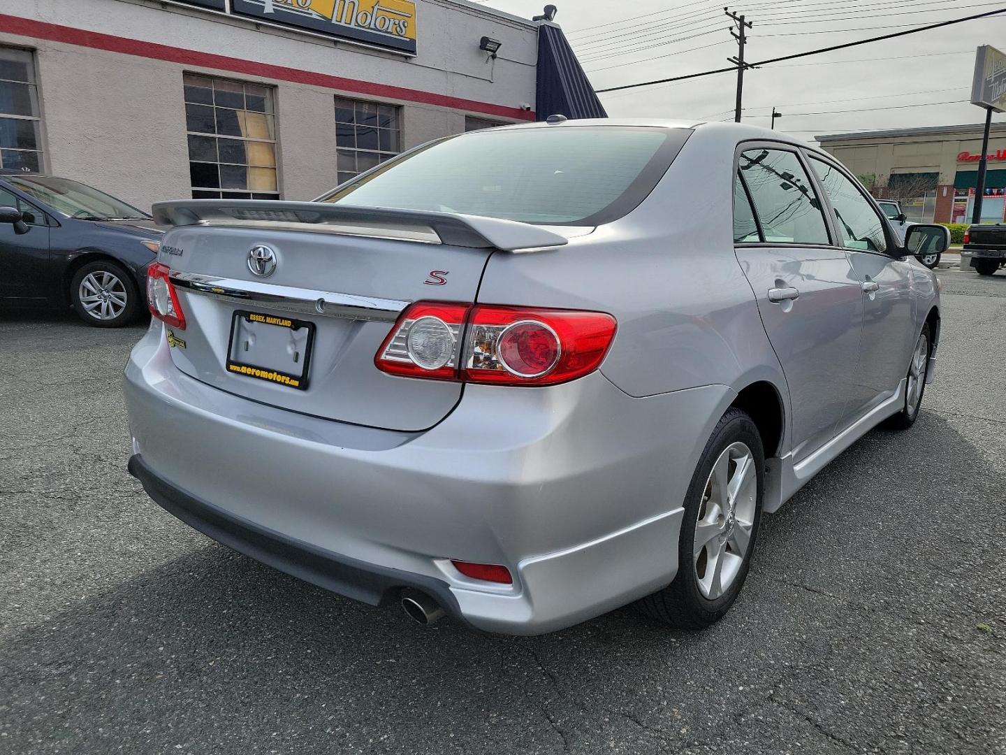 2011 Classic Silver Metallic - 1F7 /Dark Charcoal - FD17 Toyota Corolla S (2T1BU4EE3BC) with an 1.8L DOHC SFI 16-valve VVT-i I4 engine engine, located at 50 Eastern Blvd., Essex, MD, 21221, (410) 686-3444, 39.304367, -76.484947 - Introducing the stunning 2011 Toyota Corolla S 4-door sedan, finished in a captivating silver exterior. This highly sought-after model boasts an efficient 1.8L DOHC SFI 16-valve VVT-i I4 engine, designed with Toyota's advanced engine technology for an exceptional mix of performance and fuel efficien - Photo#3