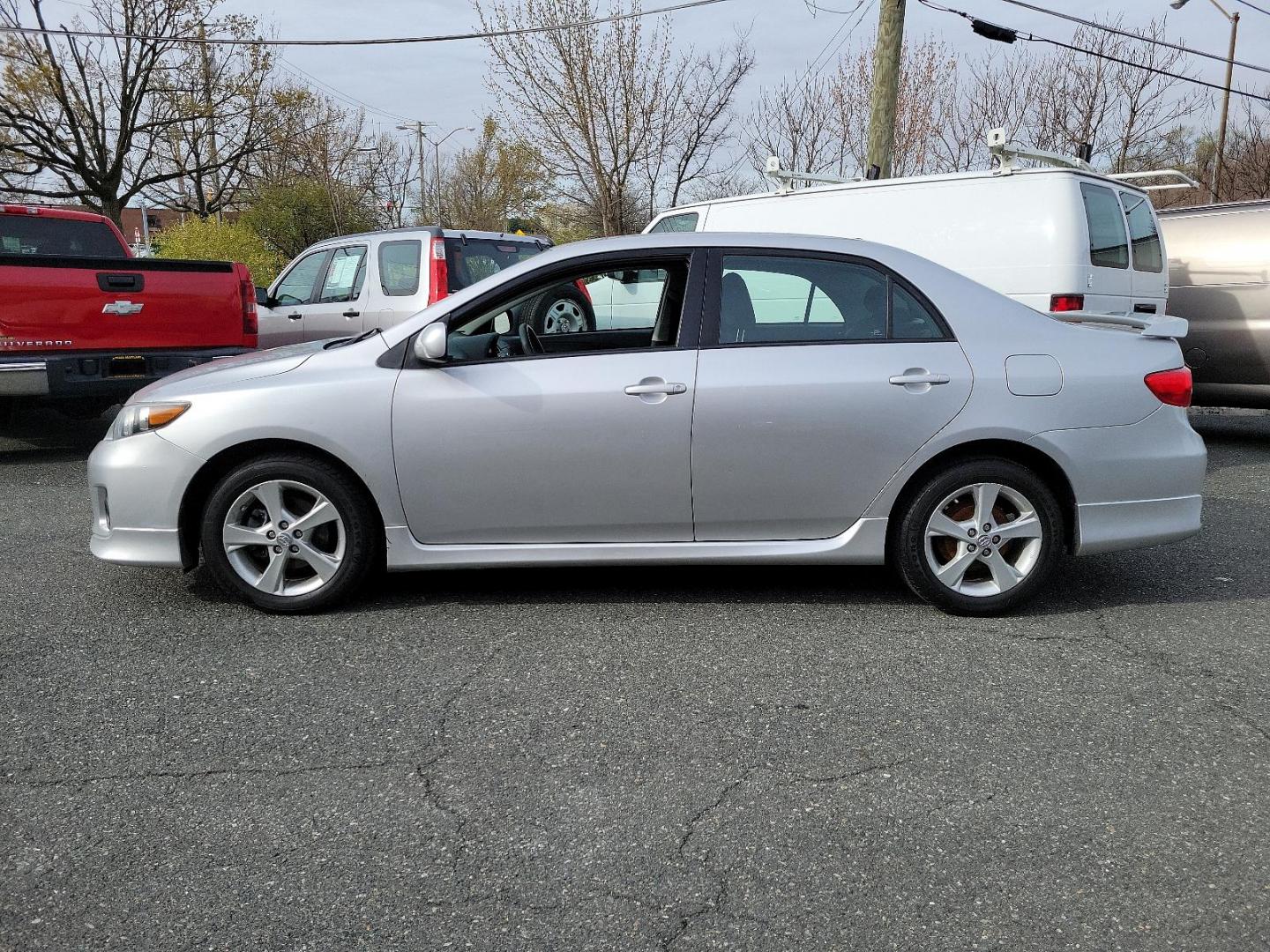 2011 Classic Silver Metallic - 1F7 /Dark Charcoal - FD17 Toyota Corolla S (2T1BU4EE3BC) with an 1.8L DOHC SFI 16-valve VVT-i I4 engine engine, located at 50 Eastern Blvd., Essex, MD, 21221, (410) 686-3444, 39.304367, -76.484947 - Introducing the stunning 2011 Toyota Corolla S 4-door sedan, finished in a captivating silver exterior. This highly sought-after model boasts an efficient 1.8L DOHC SFI 16-valve VVT-i I4 engine, designed with Toyota's advanced engine technology for an exceptional mix of performance and fuel efficien - Photo#6