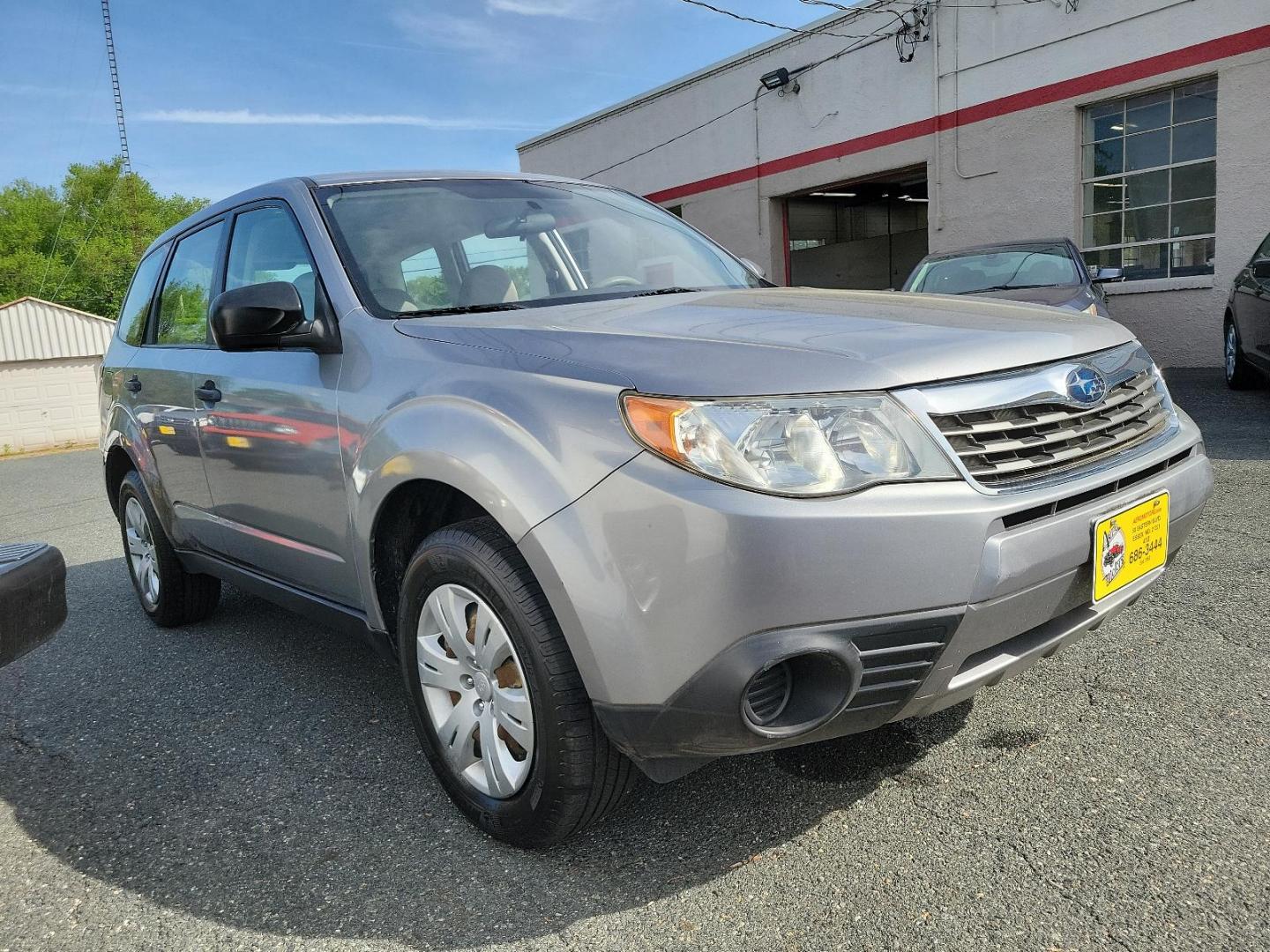 2010 Steel Silver Metallic - SSM /Aurora Platinum - APC Subaru Forester 2.5X (JF2SH6AC5AH) with an 2.5L SOHC SMPI 16-valve 4-cyl boxer engine engine, located at 50 Eastern Blvd., Essex, MD, 21221, (410) 686-3444, 39.304367, -76.484947 - Experience the impeccable blend of comfort, style, and performance in this 2010 Subaru Forester 2.5X. Encased in a striking Steel Silver Metallic exterior paired with an elegant Aurora Platinum interior, this SUV is a statement of sophistication. An ideal choice for the discerning driver, the 2.5l S - Photo#2