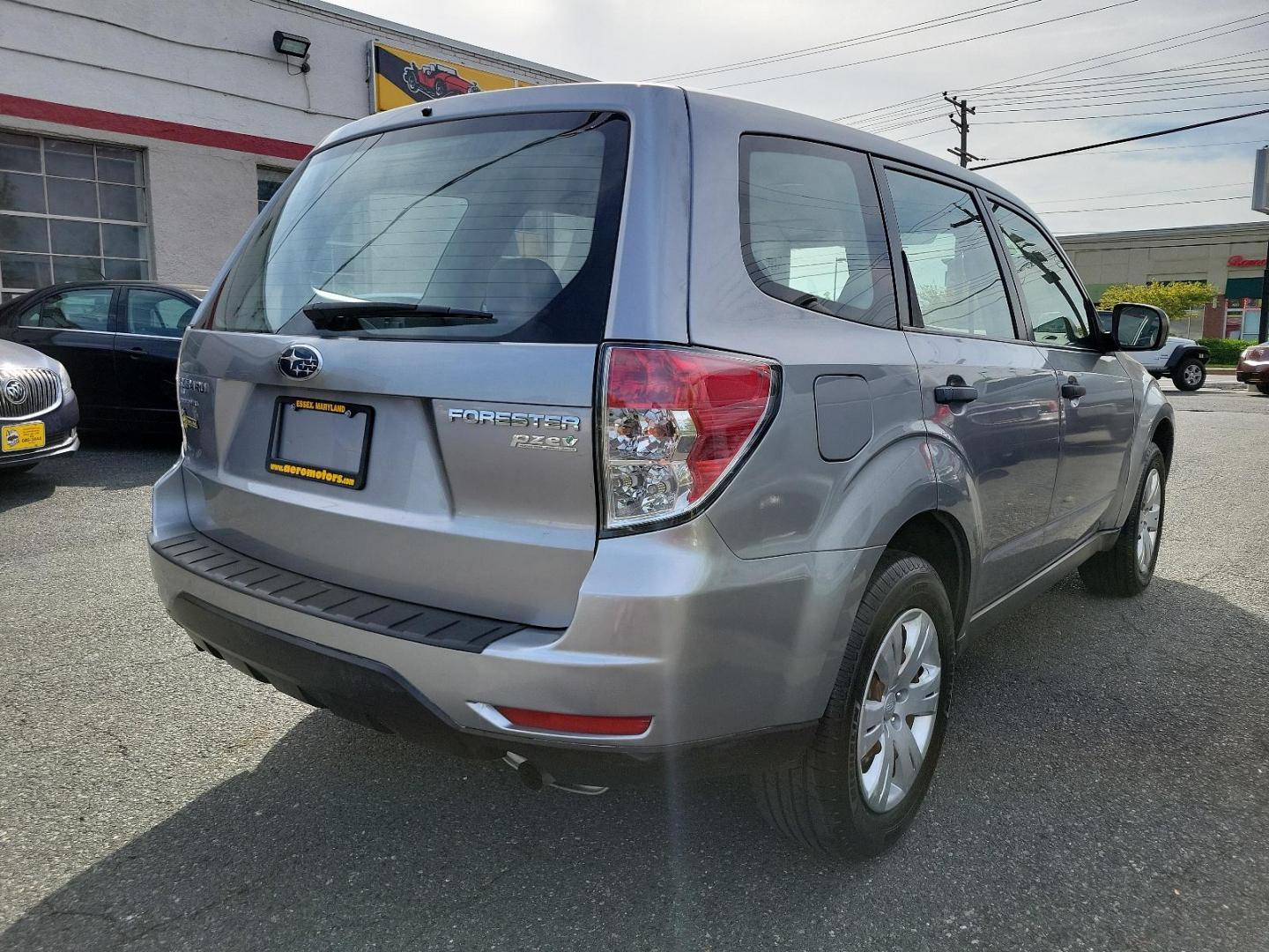 2010 Steel Silver Metallic - SSM /Aurora Platinum - APC Subaru Forester 2.5X (JF2SH6AC5AH) with an 2.5L SOHC SMPI 16-valve 4-cyl boxer engine engine, located at 50 Eastern Blvd., Essex, MD, 21221, (410) 686-3444, 39.304367, -76.484947 - Experience the impeccable blend of comfort, style, and performance in this 2010 Subaru Forester 2.5X. Encased in a striking Steel Silver Metallic exterior paired with an elegant Aurora Platinum interior, this SUV is a statement of sophistication. An ideal choice for the discerning driver, the 2.5l S - Photo#3