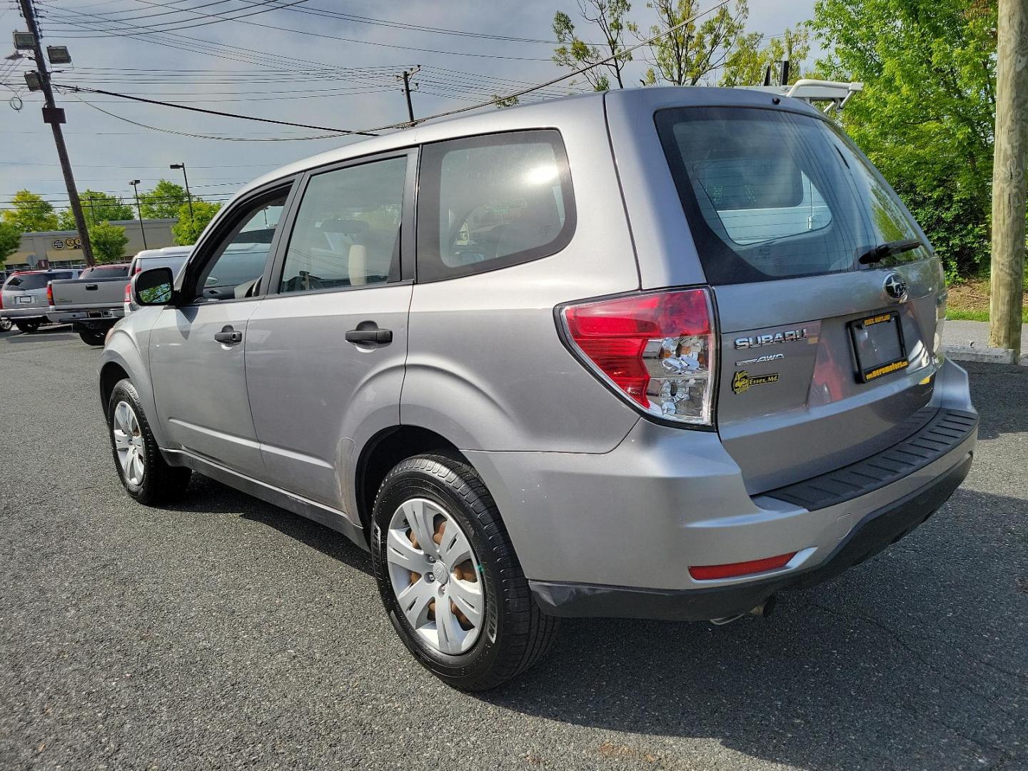 2010 Steel Silver Metallic - SSM /Aurora Platinum - APC Subaru Forester 2.5X (JF2SH6AC5AH) with an 2.5L SOHC SMPI 16-valve 4-cyl boxer engine engine, located at 50 Eastern Blvd., Essex, MD, 21221, (410) 686-3444, 39.304367, -76.484947 - Experience the impeccable blend of comfort, style, and performance in this 2010 Subaru Forester 2.5X. Encased in a striking Steel Silver Metallic exterior paired with an elegant Aurora Platinum interior, this SUV is a statement of sophistication. An ideal choice for the discerning driver, the 2.5l S - Photo#5