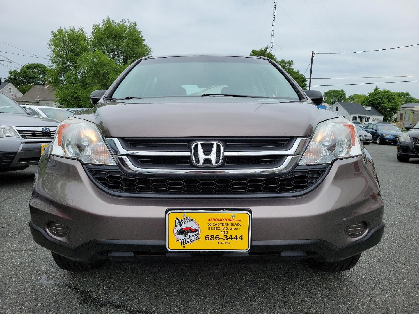 2010 Urban Titanium Metallic - BR /Black - BK Honda CR-V LX (5J6RE4H3XAL) with an 2.4L DOHC MPFI 16-valve i-VTEC I4 engine engine, located at 50 Eastern Blvd., Essex, MD, 21221, (410) 686-3444, 39.304367, -76.484947 - Unleash the power of versatility with this 2010 Honda CR-V LX 4WD. Dressed in an Urban Titanium Metallic exterior and a sleek Black interior, this car embodies style and sophistication. Under the hood, you'll find a robust 2.4L DOHC MPFI 16-Valve i-VTEC I4 engine that delivers dynamic performance an - Photo#1