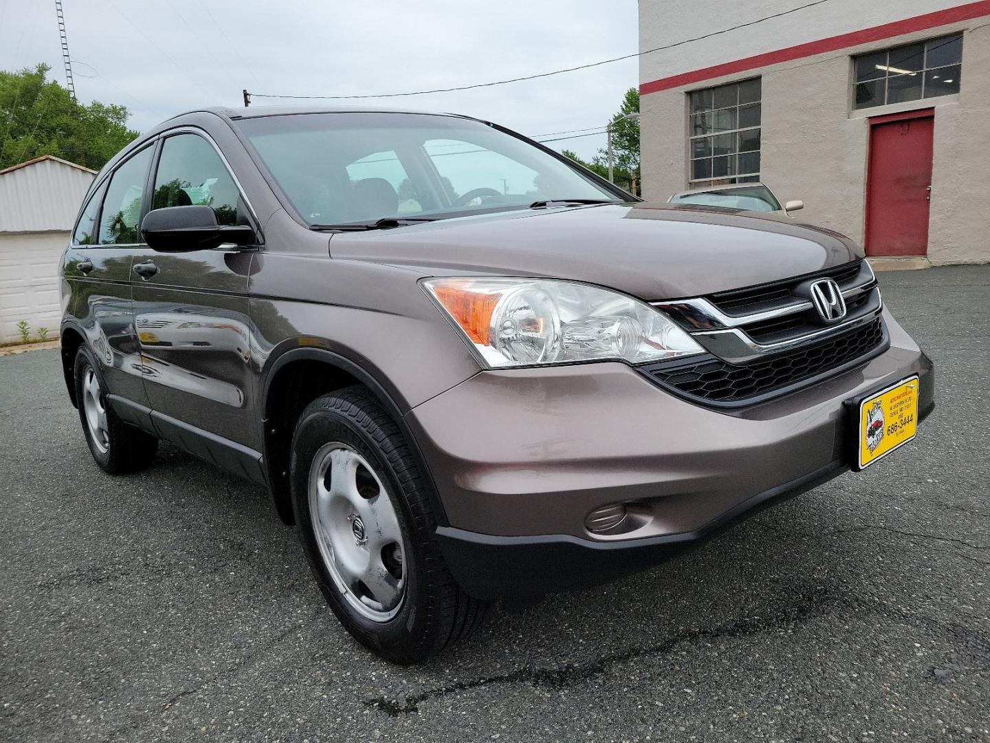 2010 Urban Titanium Metallic - BR /Black - BK Honda CR-V LX (5J6RE4H3XAL) with an 2.4L DOHC MPFI 16-valve i-VTEC I4 engine engine, located at 50 Eastern Blvd., Essex, MD, 21221, (410) 686-3444, 39.304367, -76.484947 - Unleash the power of versatility with this 2010 Honda CR-V LX 4WD. Dressed in an Urban Titanium Metallic exterior and a sleek Black interior, this car embodies style and sophistication. Under the hood, you'll find a robust 2.4L DOHC MPFI 16-Valve i-VTEC I4 engine that delivers dynamic performance an - Photo#2