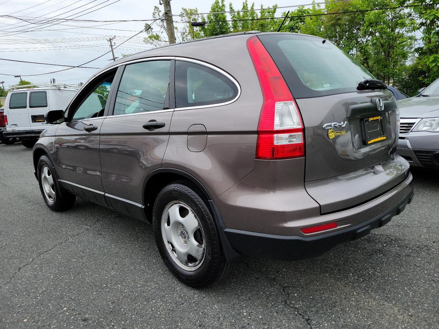 2010 Urban Titanium Metallic - BR /Black - BK Honda CR-V LX (5J6RE4H3XAL) with an 2.4L DOHC MPFI 16-valve i-VTEC I4 engine engine, located at 50 Eastern Blvd., Essex, MD, 21221, (410) 686-3444, 39.304367, -76.484947 - Unleash the power of versatility with this 2010 Honda CR-V LX 4WD. Dressed in an Urban Titanium Metallic exterior and a sleek Black interior, this car embodies style and sophistication. Under the hood, you'll find a robust 2.4L DOHC MPFI 16-Valve i-VTEC I4 engine that delivers dynamic performance an - Photo#5