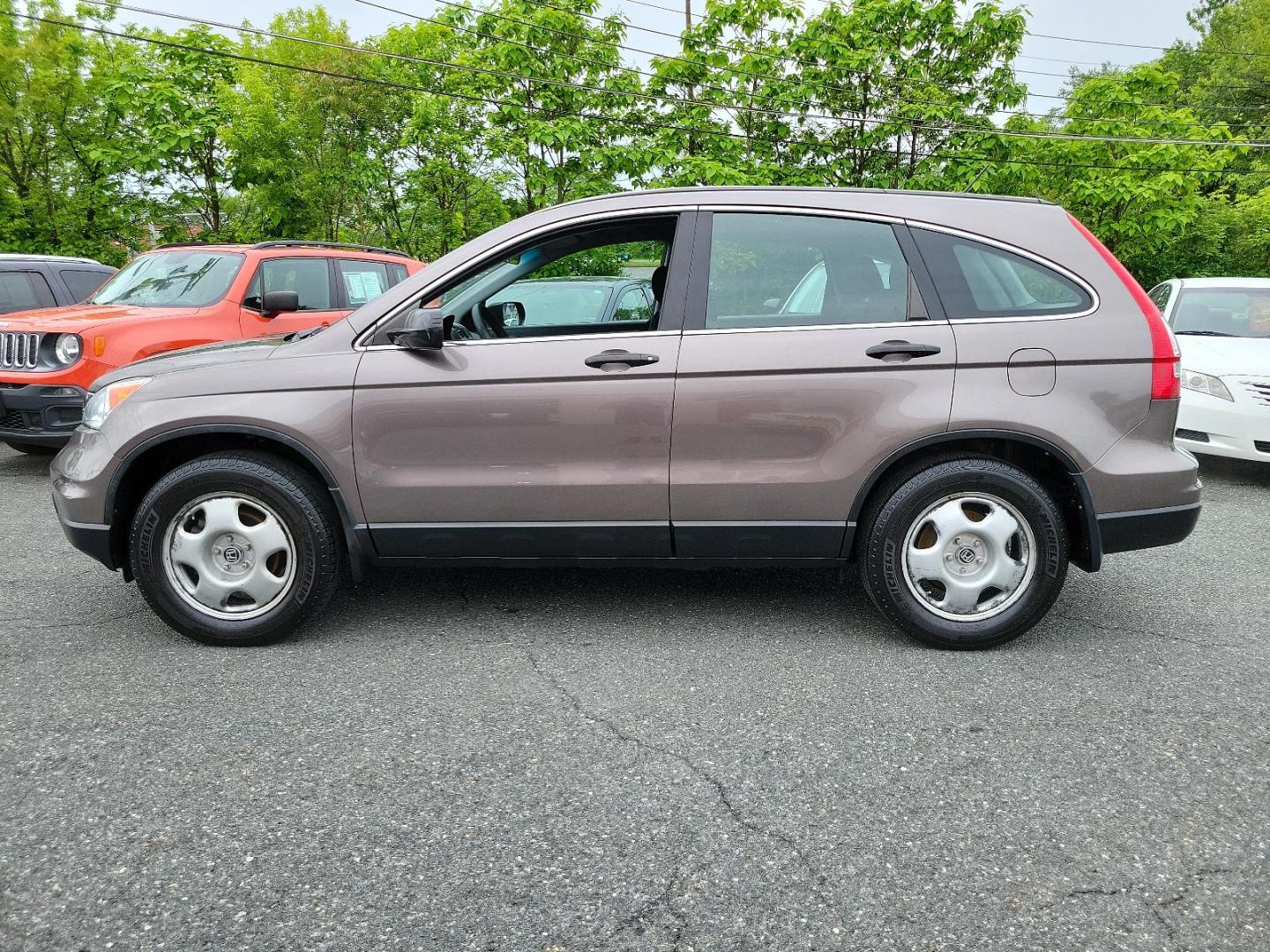 2010 Urban Titanium Metallic - BR /Black - BK Honda CR-V LX (5J6RE4H3XAL) with an 2.4L DOHC MPFI 16-valve i-VTEC I4 engine engine, located at 50 Eastern Blvd., Essex, MD, 21221, (410) 686-3444, 39.304367, -76.484947 - Unleash the power of versatility with this 2010 Honda CR-V LX 4WD. Dressed in an Urban Titanium Metallic exterior and a sleek Black interior, this car embodies style and sophistication. Under the hood, you'll find a robust 2.4L DOHC MPFI 16-Valve i-VTEC I4 engine that delivers dynamic performance an - Photo#6