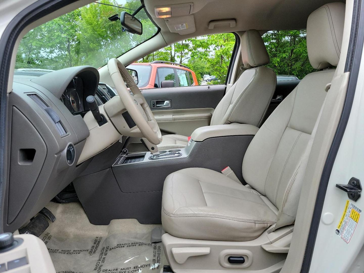 2009 White Platinum Tri-Coat - UG /Medium light stone - 2L Ford Edge SEL (2FMDK48C19B) with an 3.5L V6 DURATEC ENGINE engine, located at 50 Eastern Blvd., Essex, MD, 21221, (410) 686-3444, 39.304367, -76.484947 - Step into sophistication with this 2009 Ford Edge SEL, a masterpiece of design and performance. Outshining competitors, it's distinctively finished in a White Platinum Tri-Coat - UG exterior, matched flawlessly by a Medium Light Stone - 2L interior. The dynamic All-Wheel Drive (AWD) capability ensur - Photo#12