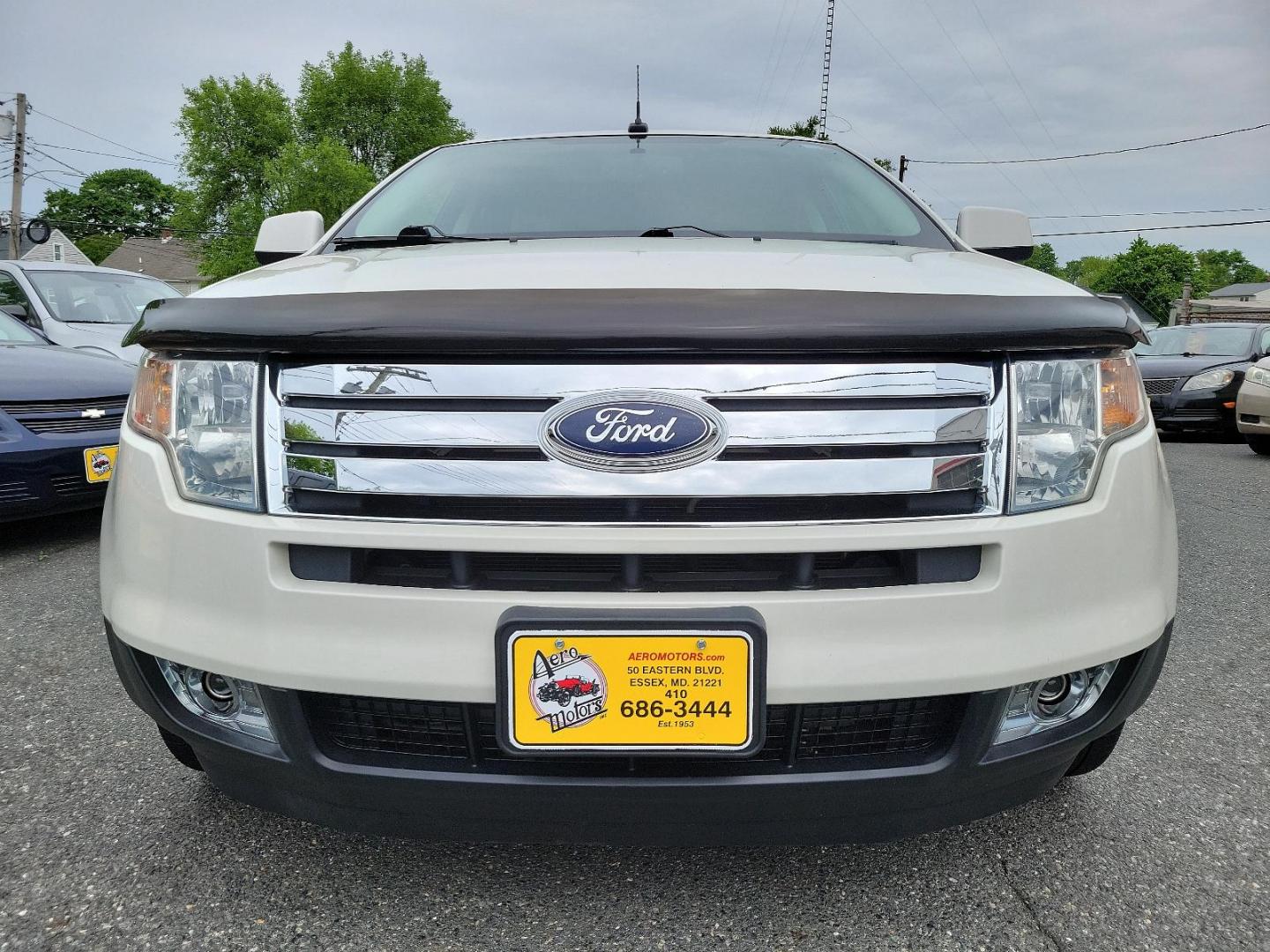 2009 White Platinum Tri-Coat - UG /Medium light stone - 2L Ford Edge SEL (2FMDK48C19B) with an 3.5L V6 DURATEC ENGINE engine, located at 50 Eastern Blvd., Essex, MD, 21221, (410) 686-3444, 39.304367, -76.484947 - Step into sophistication with this 2009 Ford Edge SEL, a masterpiece of design and performance. Outshining competitors, it's distinctively finished in a White Platinum Tri-Coat - UG exterior, matched flawlessly by a Medium Light Stone - 2L interior. The dynamic All-Wheel Drive (AWD) capability ensur - Photo#1