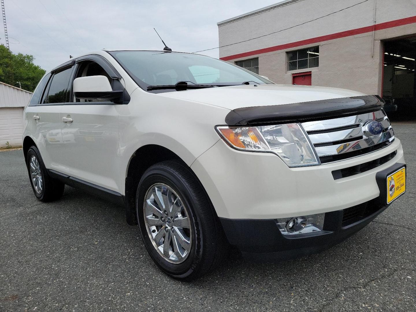 2009 White Platinum Tri-Coat - UG /Medium light stone - 2L Ford Edge SEL (2FMDK48C19B) with an 3.5L V6 DURATEC ENGINE engine, located at 50 Eastern Blvd., Essex, MD, 21221, (410) 686-3444, 39.304367, -76.484947 - Step into sophistication with this 2009 Ford Edge SEL, a masterpiece of design and performance. Outshining competitors, it's distinctively finished in a White Platinum Tri-Coat - UG exterior, matched flawlessly by a Medium Light Stone - 2L interior. The dynamic All-Wheel Drive (AWD) capability ensur - Photo#2