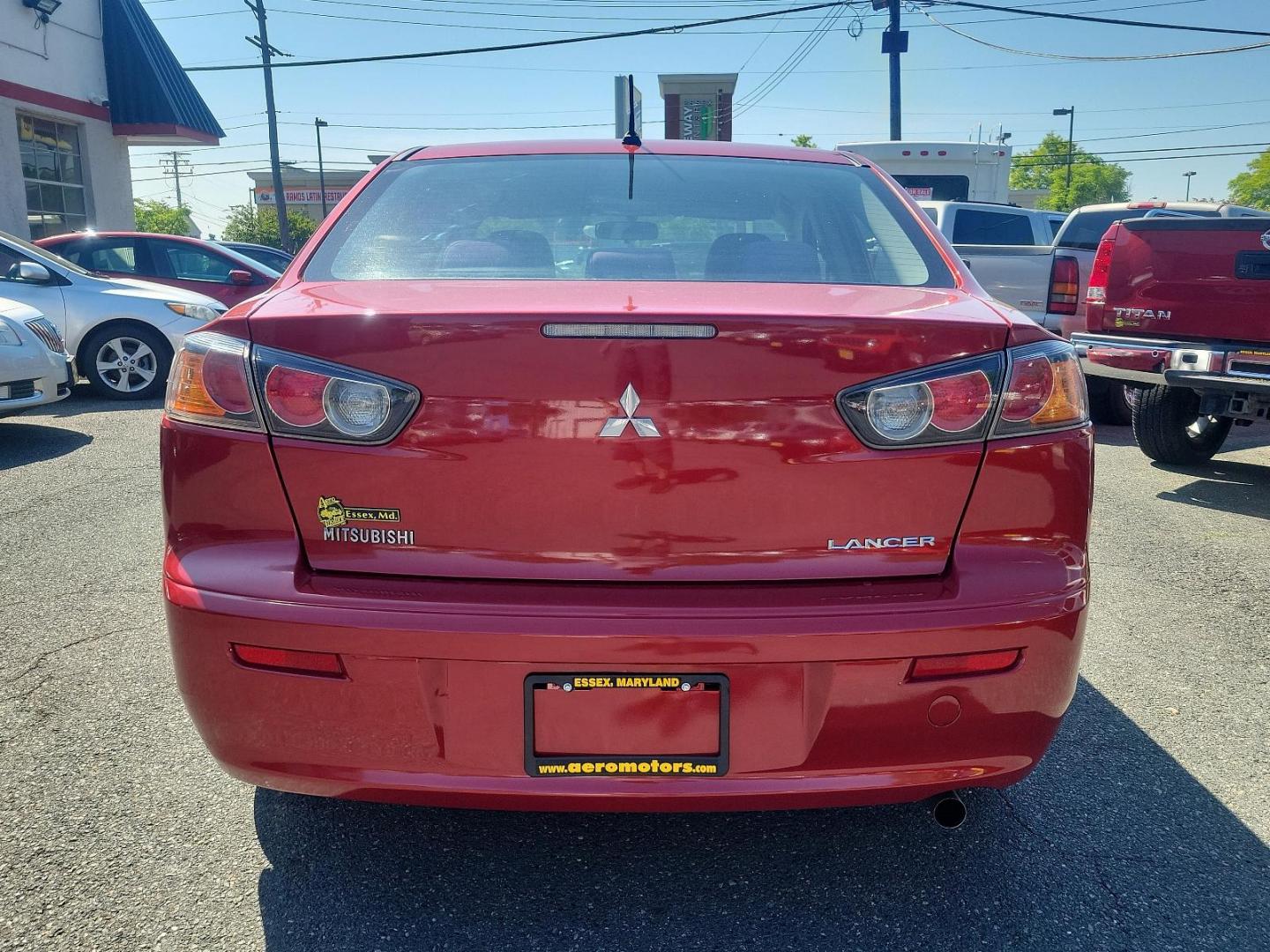 2011 Rally Red Metallic - P26 /Black - 85P Mitsubishi Lancer ES (JA32U2FU9BU) with an 2.0L DOHC MIVEC I4 engine engine, located at 50 Eastern Blvd., Essex, MD, 21221, (410) 686-3444, 39.304367, -76.484947 - Prepare yourself for the exceptional performance and stylish aesthetics of this 2011 Mitsubishi Lancer ES 4dr sdn cvt es fwd. Coated in a captivating Rally Red Metallic - p26 exterior, this Mitsubishi Lancer ES proclaims your discerning taste and eye for sophistication. Indulge in the comfort of its - Photo#4