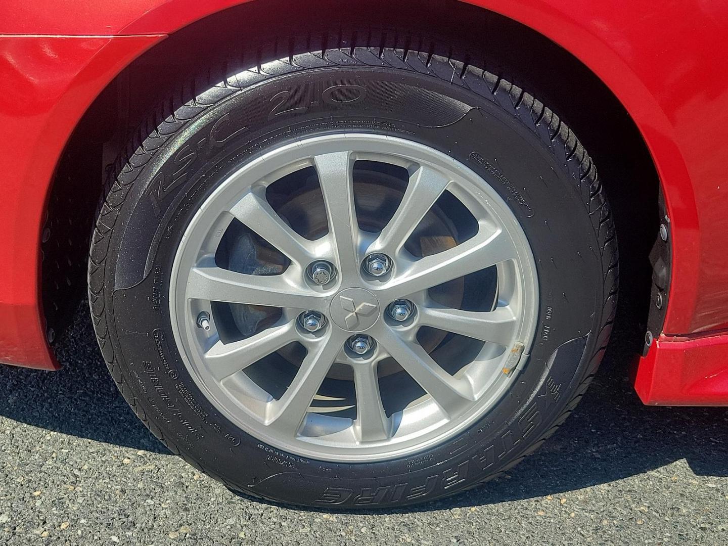 2011 Rally Red Metallic - P26 /Black - 85P Mitsubishi Lancer ES (JA32U2FU9BU) with an 2.0L DOHC MIVEC I4 engine engine, located at 50 Eastern Blvd., Essex, MD, 21221, (410) 686-3444, 39.304367, -76.484947 - Prepare yourself for the exceptional performance and stylish aesthetics of this 2011 Mitsubishi Lancer ES 4dr sdn cvt es fwd. Coated in a captivating Rally Red Metallic - p26 exterior, this Mitsubishi Lancer ES proclaims your discerning taste and eye for sophistication. Indulge in the comfort of its - Photo#7