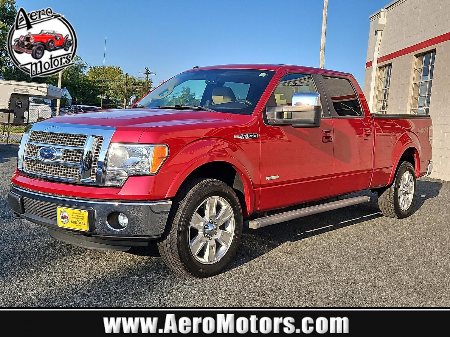 2011 Red Candy Metallic - RZ /Pale Adobe - EA Ford F-150 Lariat (1FTFW1ET9BF) with an 3.5L V6 ECOBOOST ENGINE engine, located at 50 Eastern Blvd., Essex, MD, 21221, (410) 686-3444, 39.304367, -76.484947 - Experience power, comfort and style with this stunning 2011 Ford F-150 Lariat 4WD Supercrew 157" Lariat. Showcasing a striking Red Candy Metallic-RZ exterior paired with a refined Pale Adobe-EA interior, this beast stands as a testament to Ford's superb craftsmanship. Under the hood lies a potent 3. - Photo#0