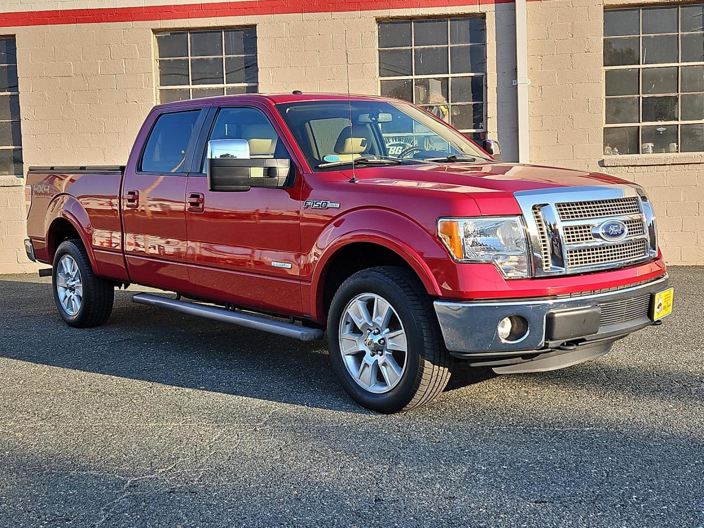 2011 Red Candy Metallic - RZ /Pale Adobe - EA Ford F-150 Lariat (1FTFW1ET9BF) with an 3.5L V6 ECOBOOST ENGINE engine, located at 50 Eastern Blvd., Essex, MD, 21221, (410) 686-3444, 39.304367, -76.484947 - Experience power, comfort and style with this stunning 2011 Ford F-150 Lariat 4WD Supercrew 157" Lariat. Showcasing a striking Red Candy Metallic-RZ exterior paired with a refined Pale Adobe-EA interior, this beast stands as a testament to Ford's superb craftsmanship. Under the hood lies a potent 3. - Photo#2