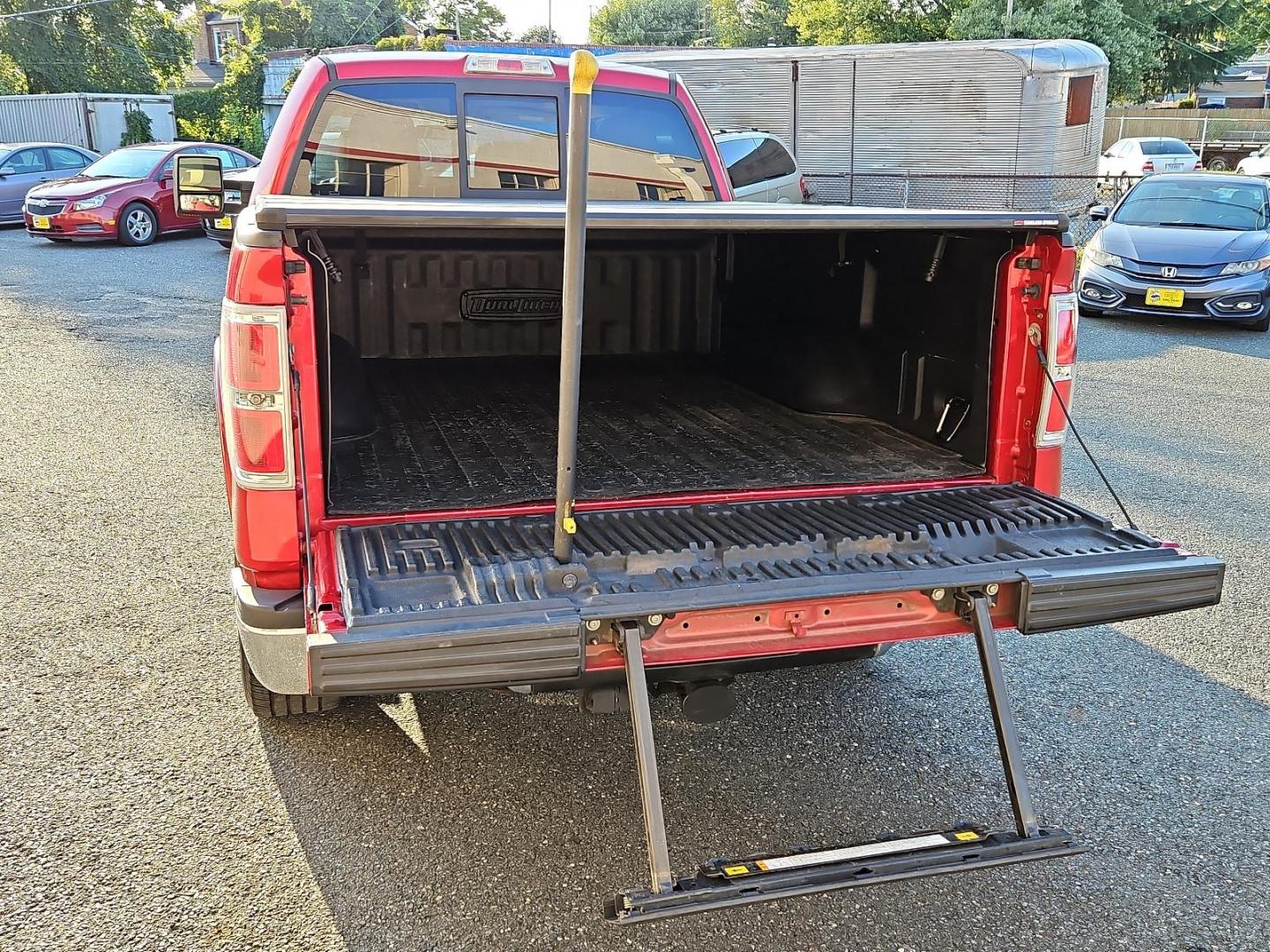 2011 Red Candy Metallic - RZ /Pale Adobe - EA Ford F-150 Lariat (1FTFW1ET9BF) with an 3.5L V6 ECOBOOST ENGINE engine, located at 50 Eastern Blvd., Essex, MD, 21221, (410) 686-3444, 39.304367, -76.484947 - Experience power, comfort and style with this stunning 2011 Ford F-150 Lariat 4WD Supercrew 157" Lariat. Showcasing a striking Red Candy Metallic-RZ exterior paired with a refined Pale Adobe-EA interior, this beast stands as a testament to Ford's superb craftsmanship. Under the hood lies a potent 3. - Photo#30