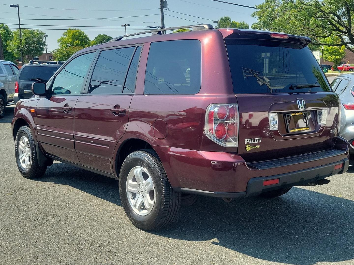 2008 Dark Cherry Pearl - RE /Gray - GR Honda Pilot VP (5FNYF182X8B) with an 3.5L SOHC MPFI 24-valve VTEC V6 engine engine, located at 50 Eastern Blvd., Essex, MD, 21221, (410) 686-3444, 39.304367, -76.484947 - Experience a superior ride with this gorgeous 2008 Honda Pilot VP, donned in a striking maroon exterior. This legendary SUV, equipped with a robust 3.5l SOHC MPFI 24-valve VTEC V6 engine, ensures a smooth yet spirited performance that Honda is renowned for. This 4WD marvel is designed for those who - Photo#5